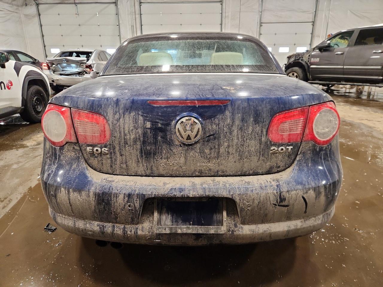 2009 Volkswagen Eos Lux Blue vin: WVWFA71F69V024483