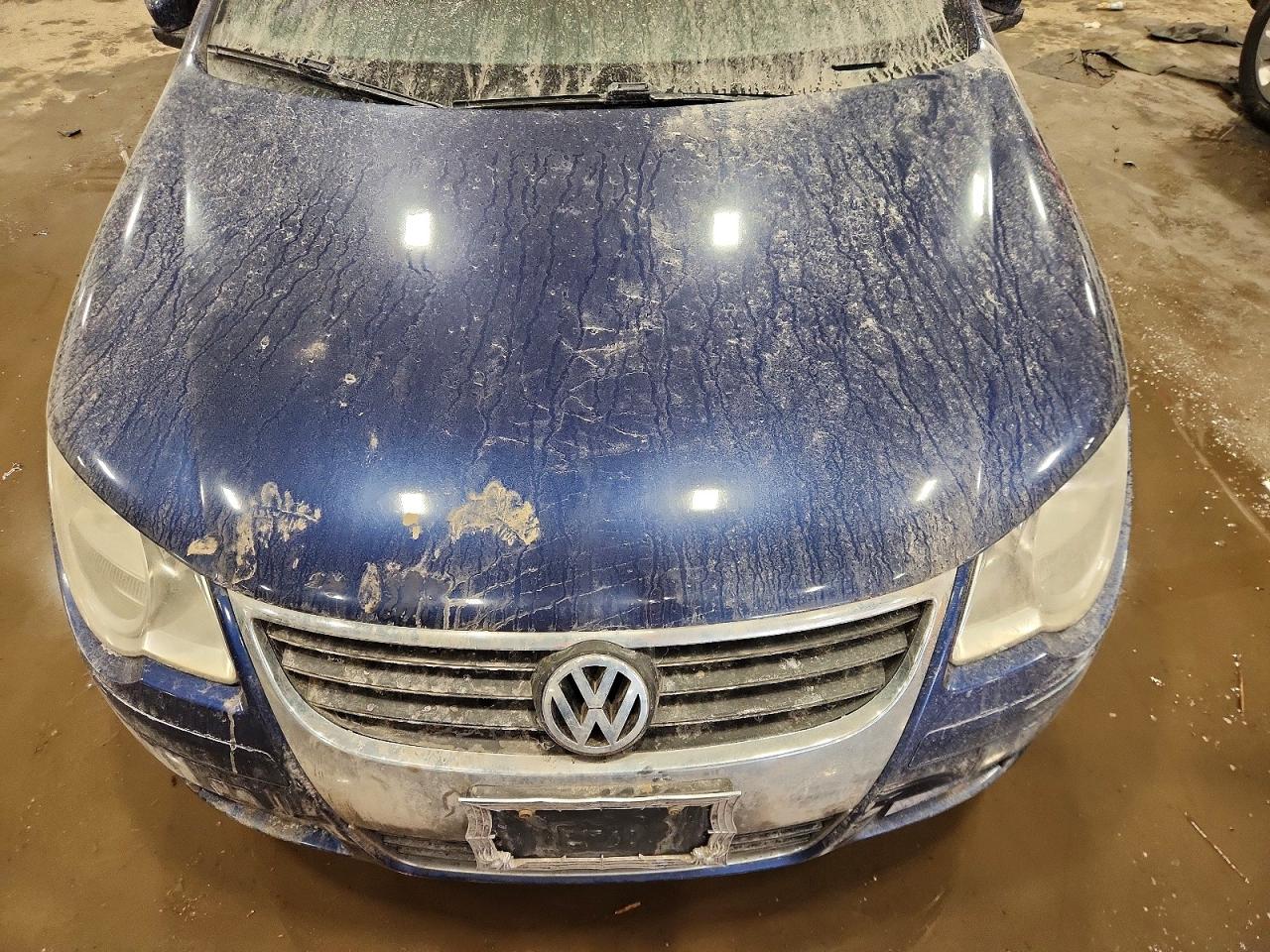 2009 Volkswagen Eos Lux Blue vin: WVWFA71F69V024483