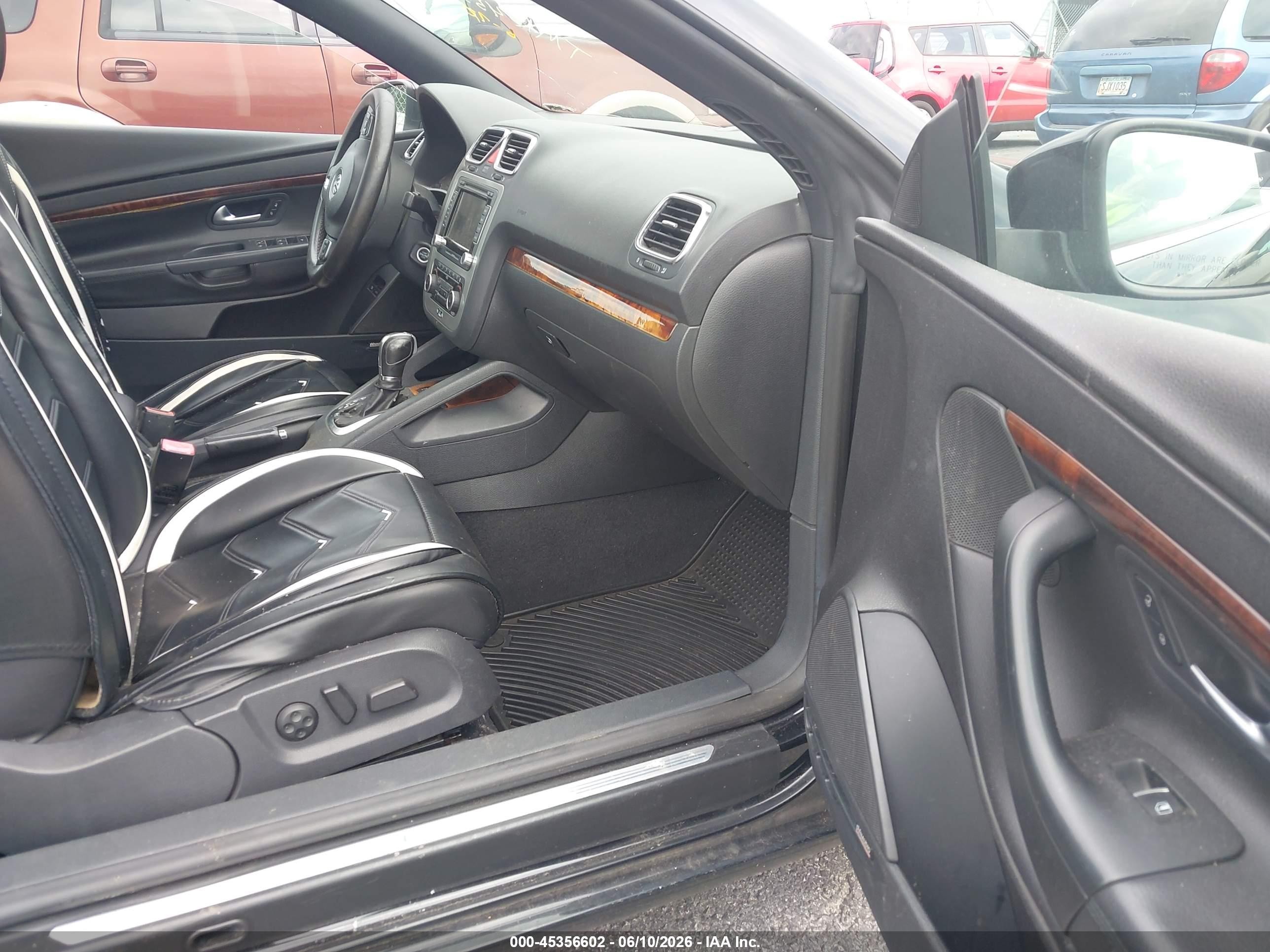 2012 Volkswagen Eos Executive Black vin: WVWFW7AH4CV001987