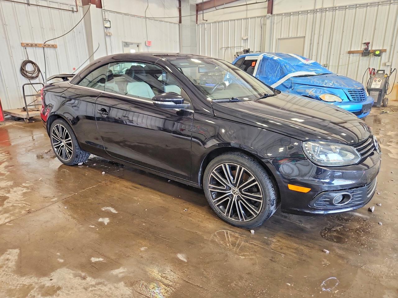 2015 Volkswagen Eos Lux Black vin: WVWFW8AH4FV001014