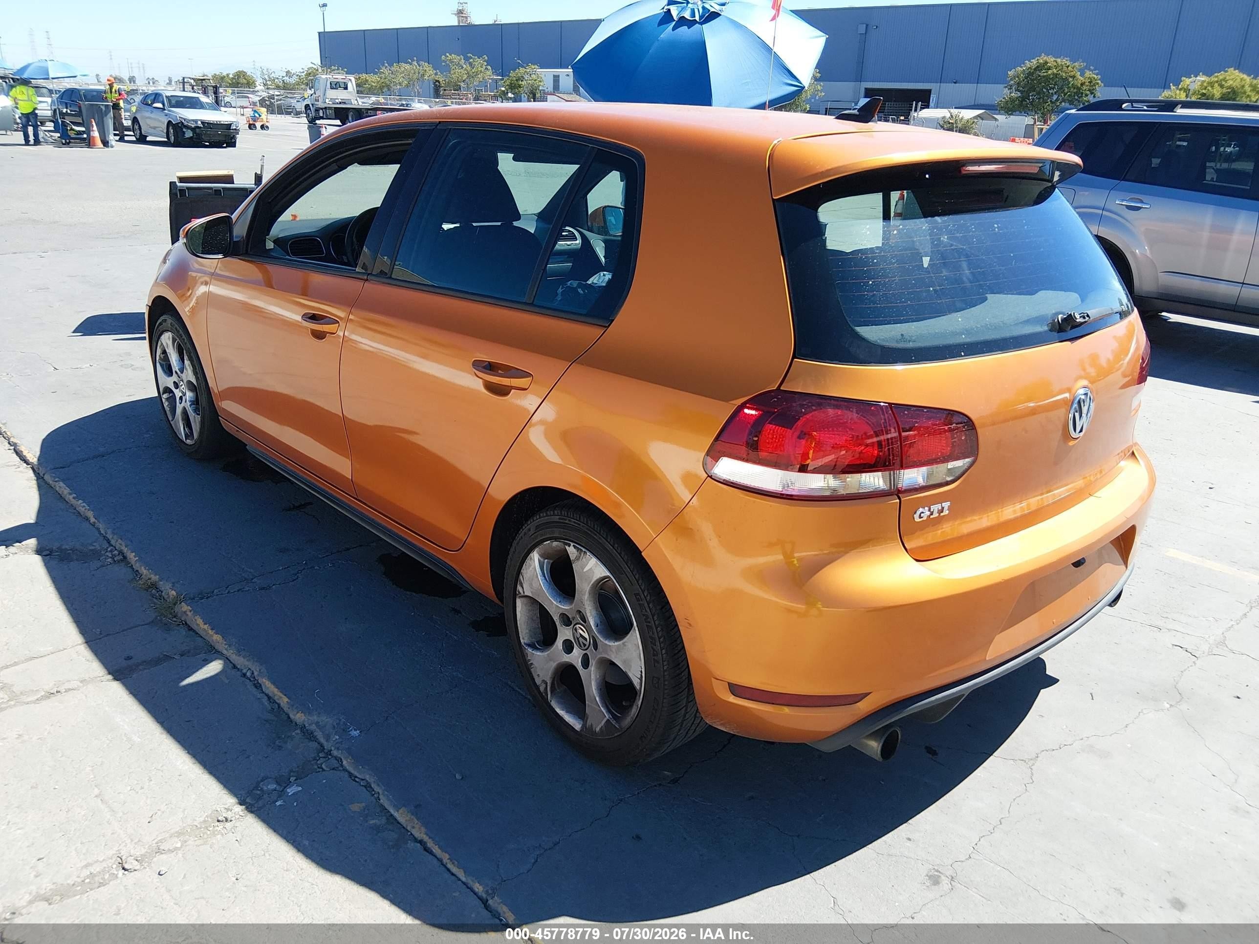 2010 Volkswagen Gti 4-door Оранжевый vin: WVWGV7AJ7AW313724