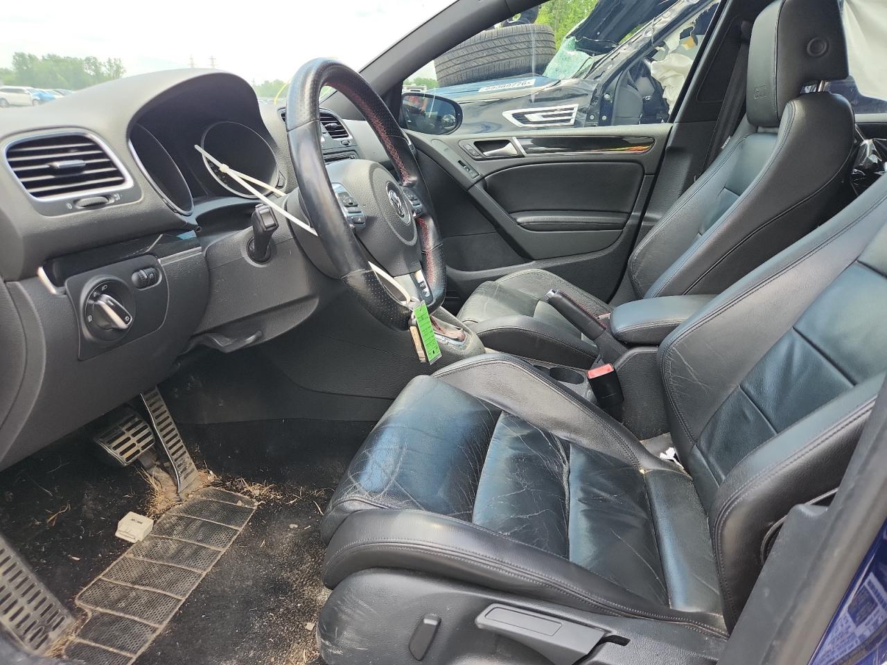 2011 Volkswagen Gti Blue vin: WVWHV7AJ4BW039632 Damage: Left Front Carpet, Stained, Permanent