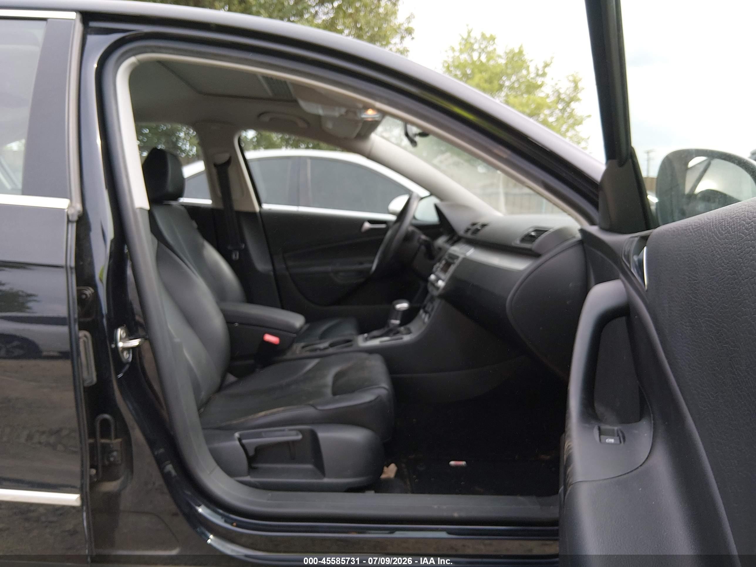 2009 Volkswagen Passat Komfort Черный vin: WVWJK73C19P014197
