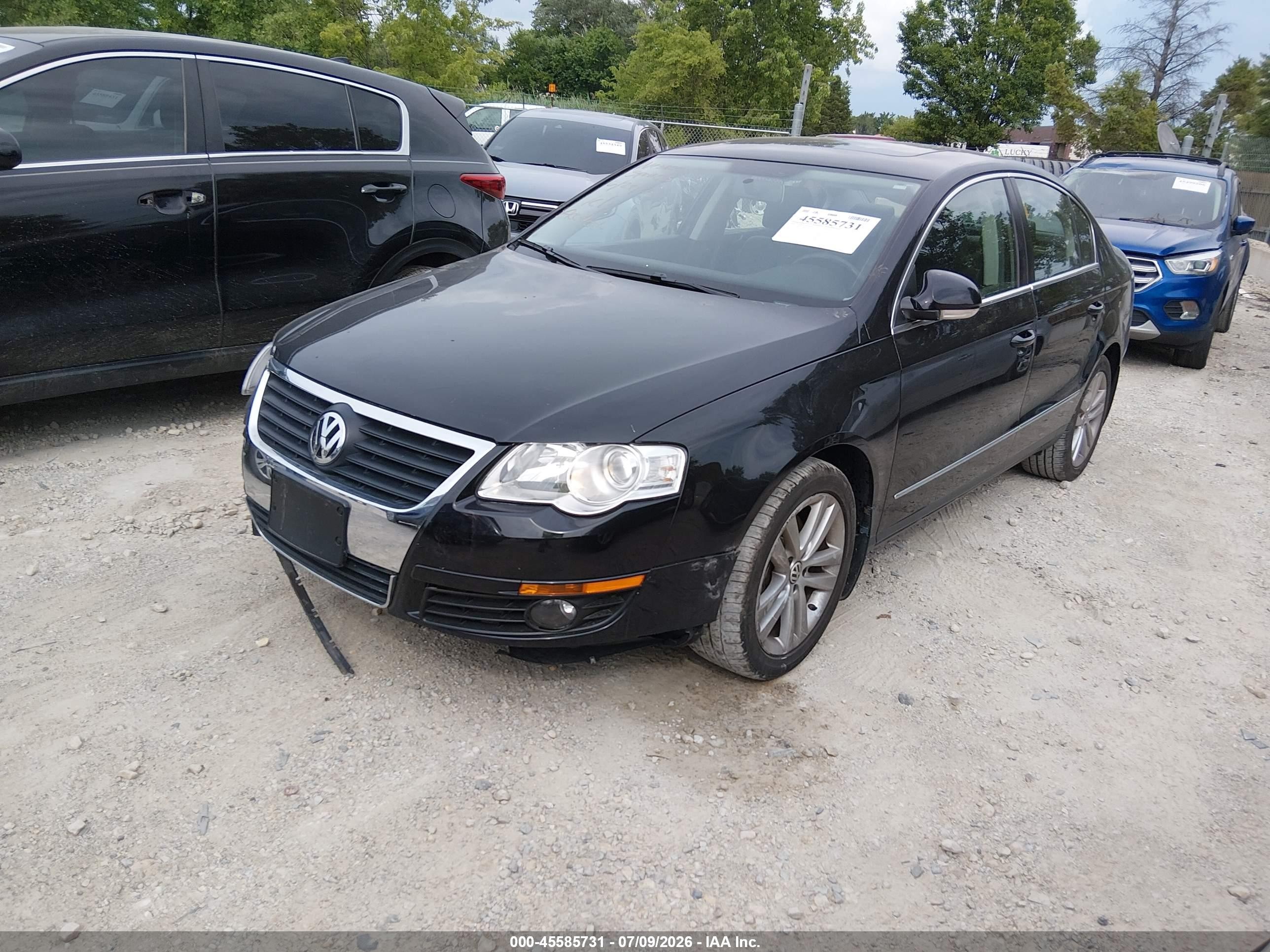 2009 Volkswagen Passat Komfort Черный vin: WVWJK73C19P014197
