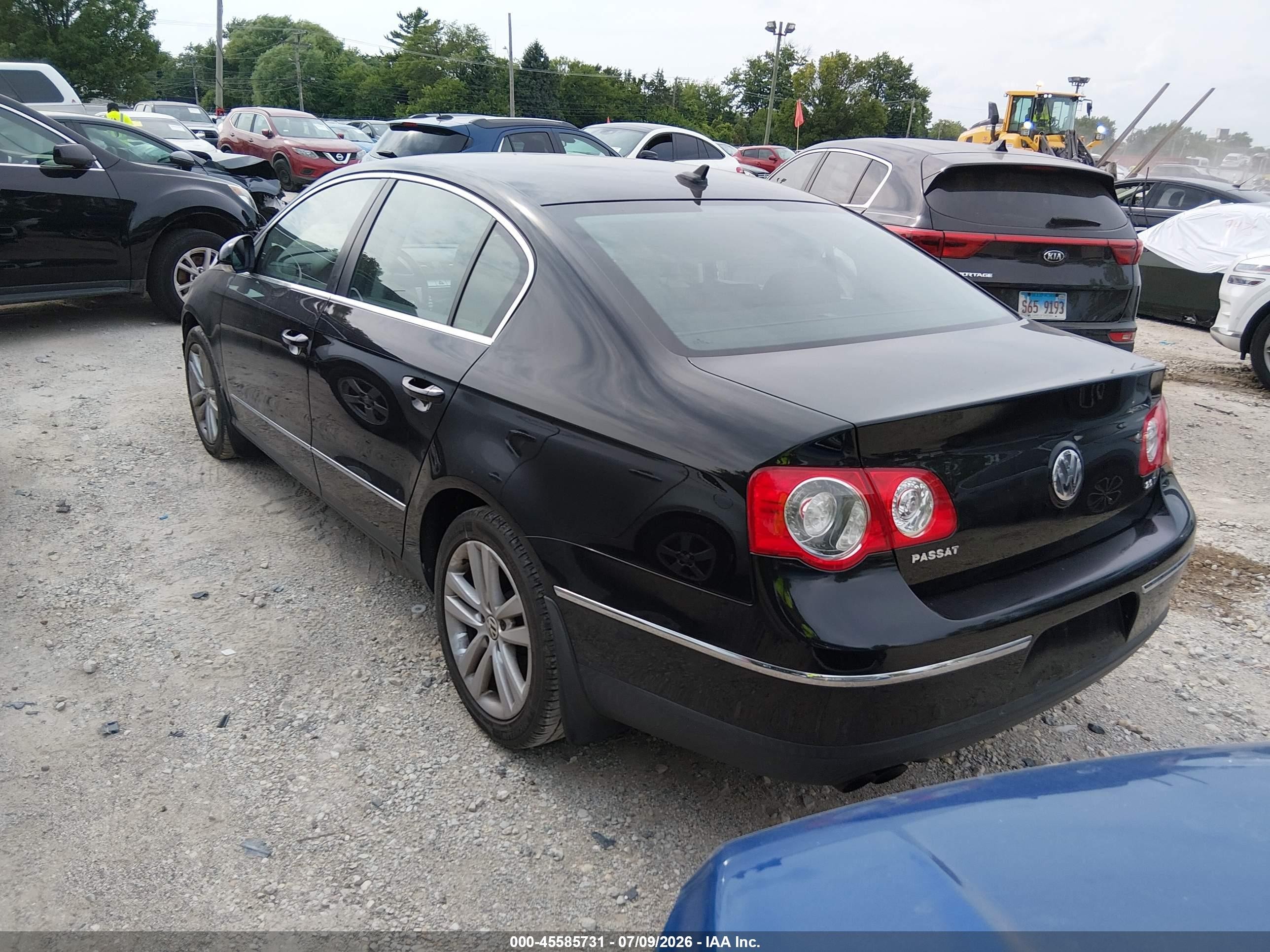 2009 Volkswagen Passat Komfort Черный vin: WVWJK73C19P014197