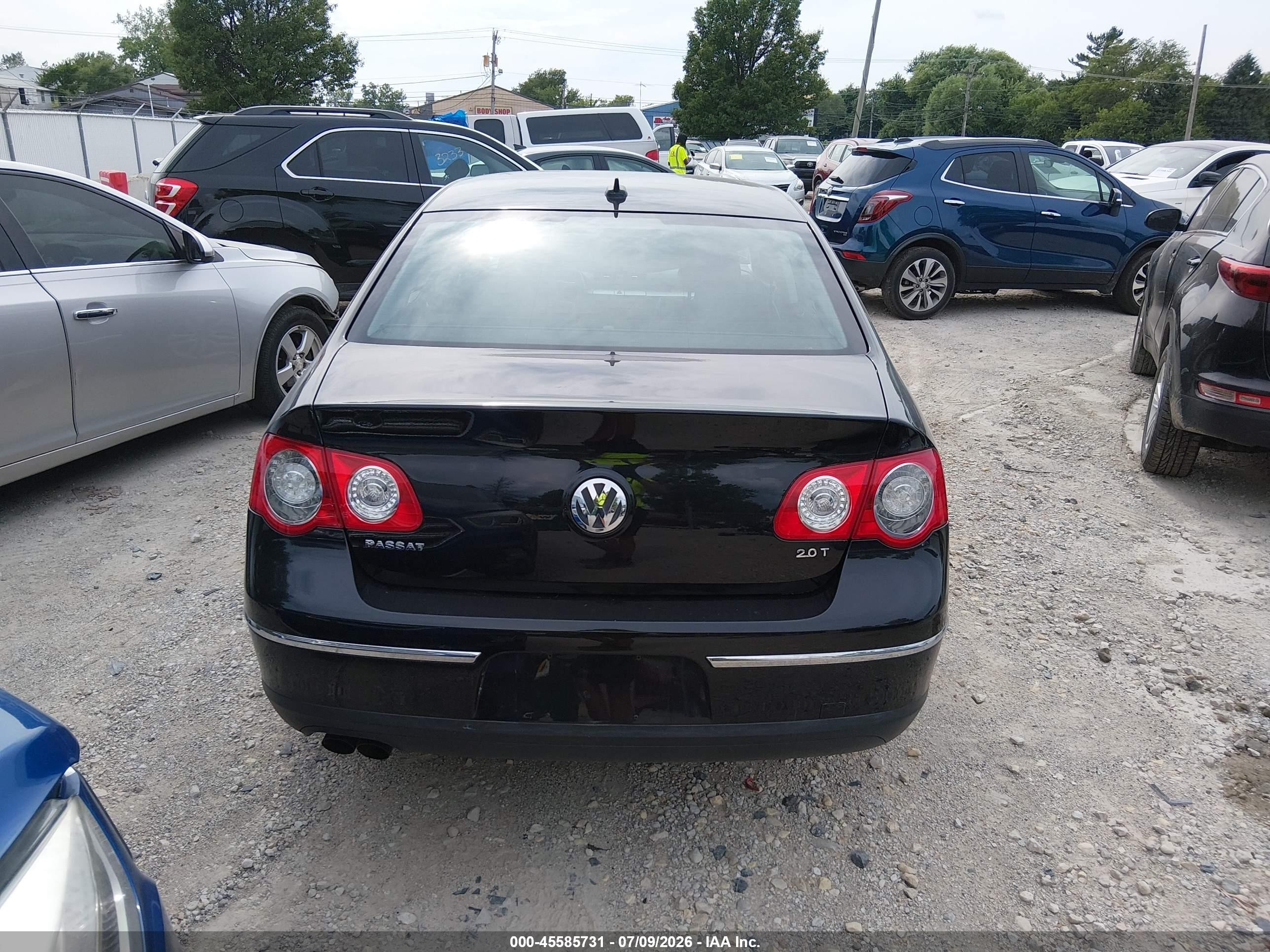 2009 Volkswagen Passat Komfort Черный vin: WVWJK73C19P014197