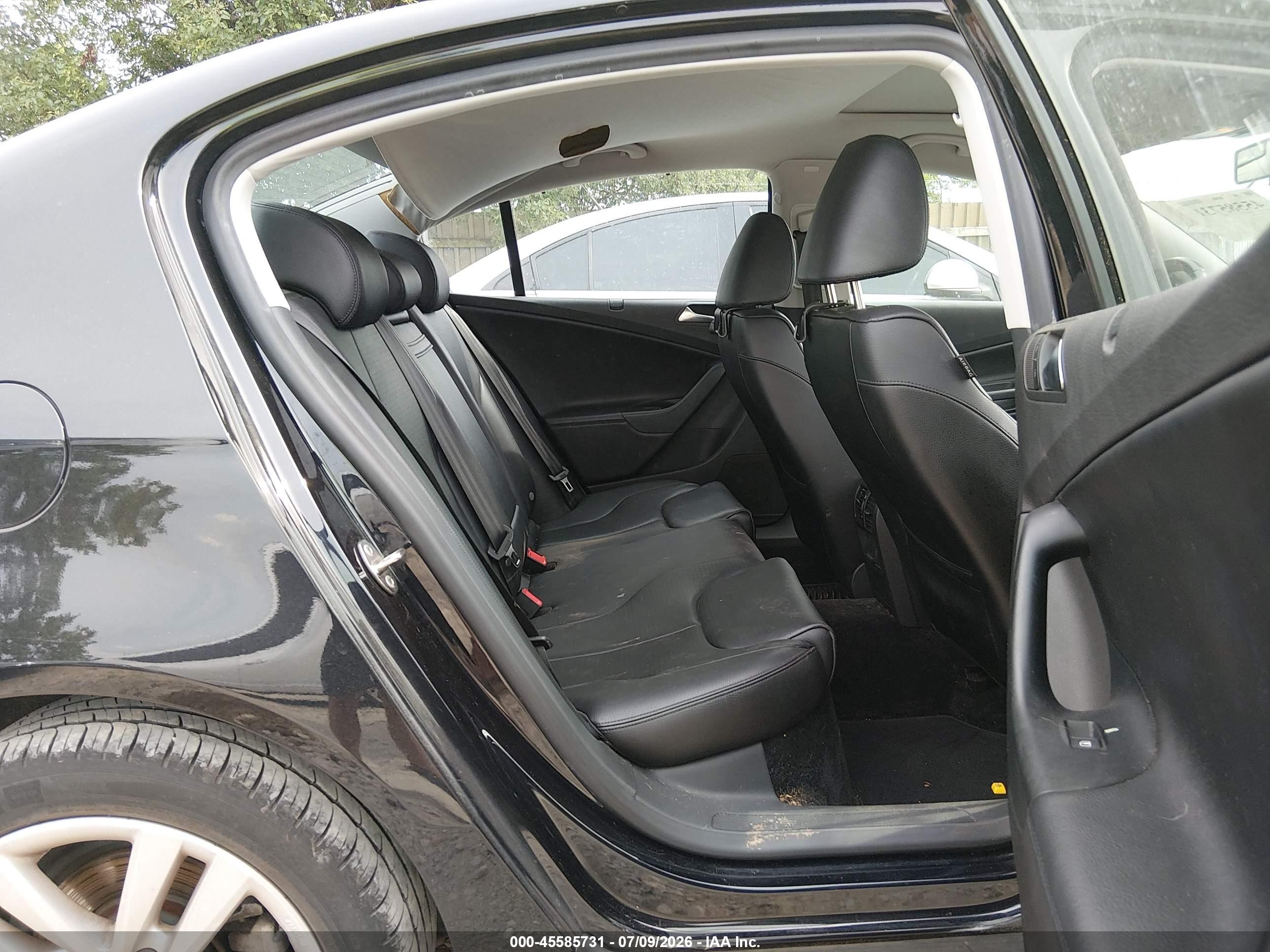 2009 Volkswagen Passat Komfort Черный vin: WVWJK73C19P014197