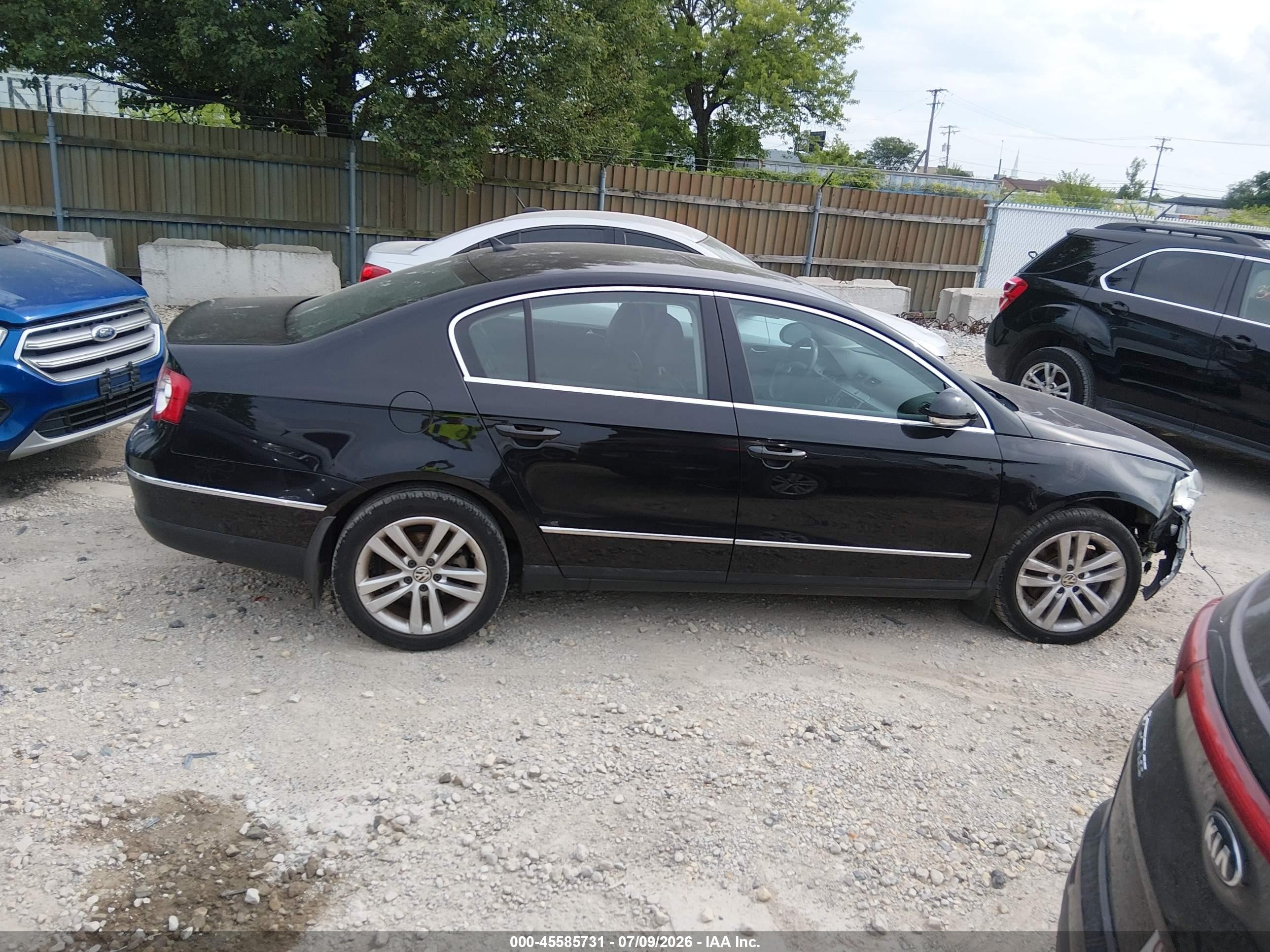 2009 Volkswagen Passat Komfort Черный vin: WVWJK73C19P014197