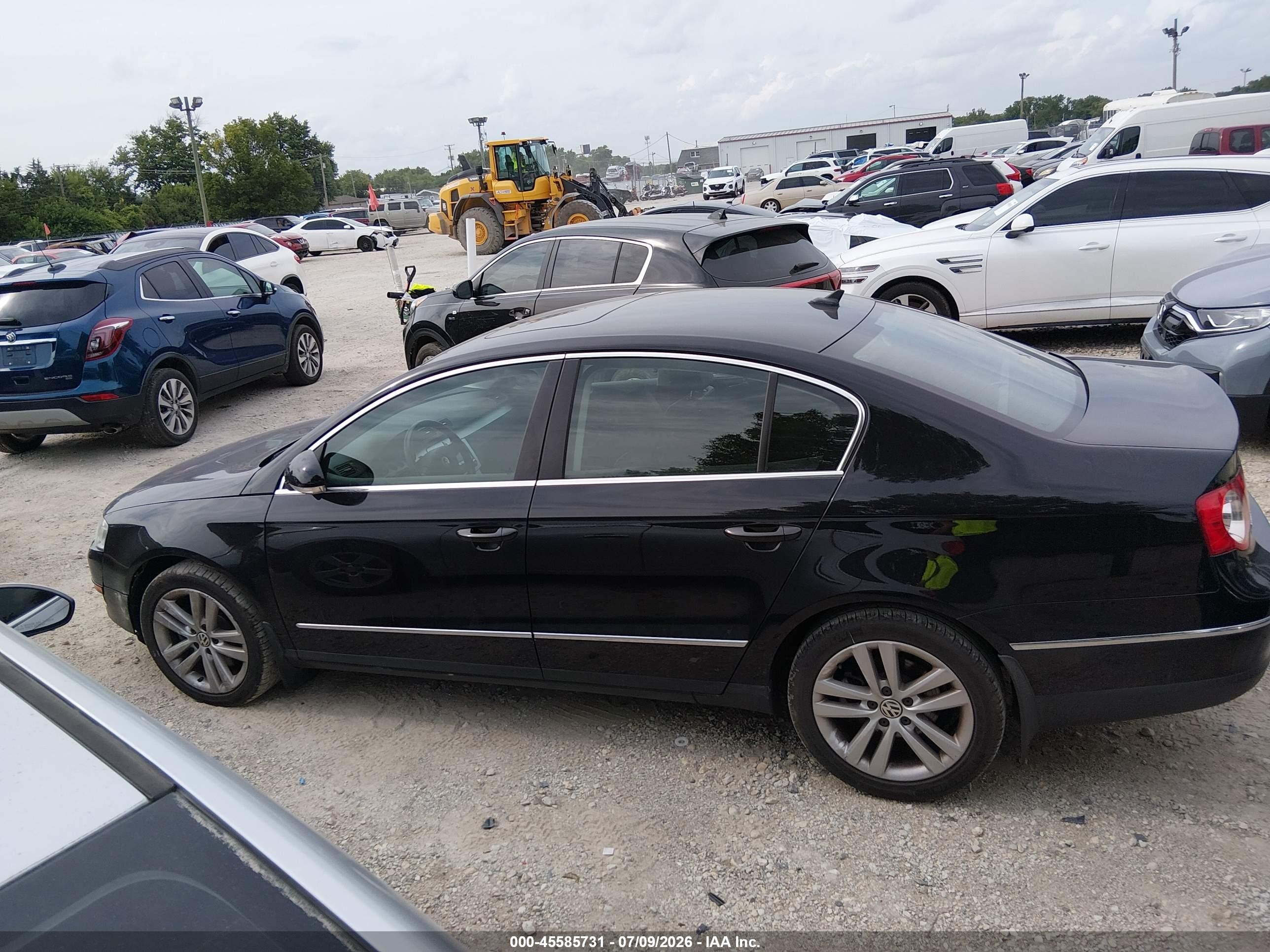 2009 Volkswagen Passat Komfort Черный vin: WVWJK73C19P014197