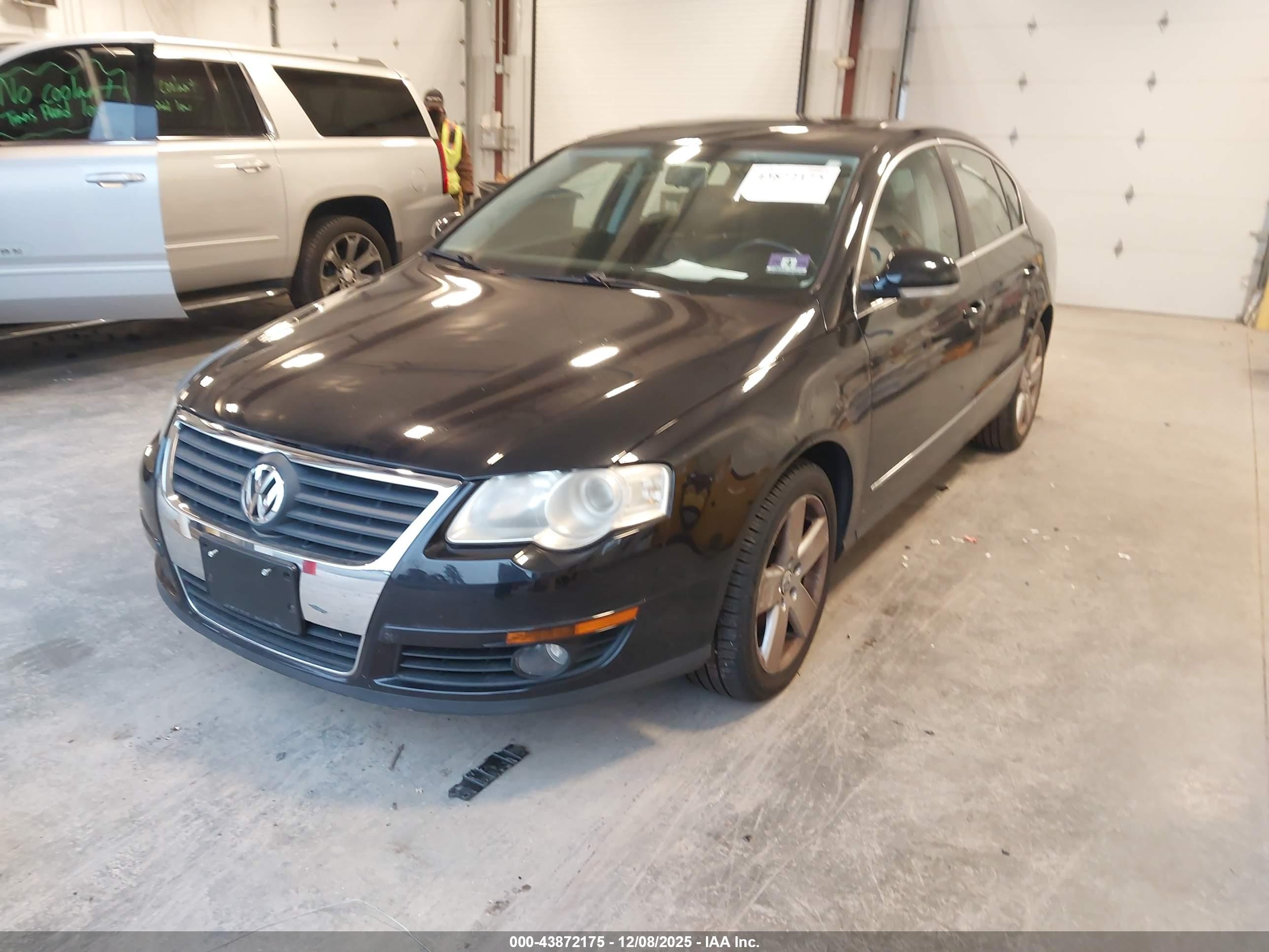 2009 Volkswagen Passat Komfort Black vin: WVWJK73C19P040900