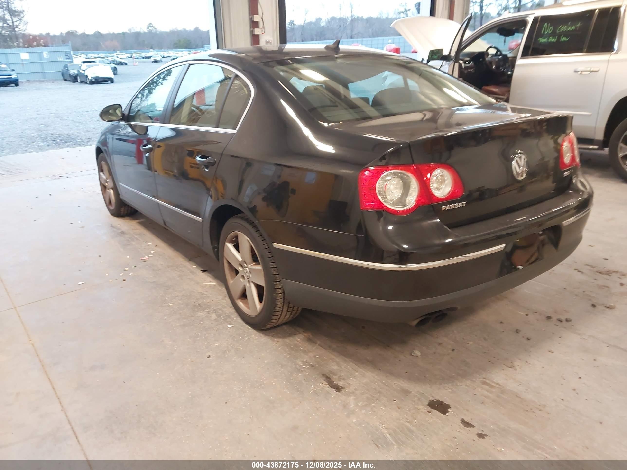 2009 Volkswagen Passat Komfort Black vin: WVWJK73C19P040900