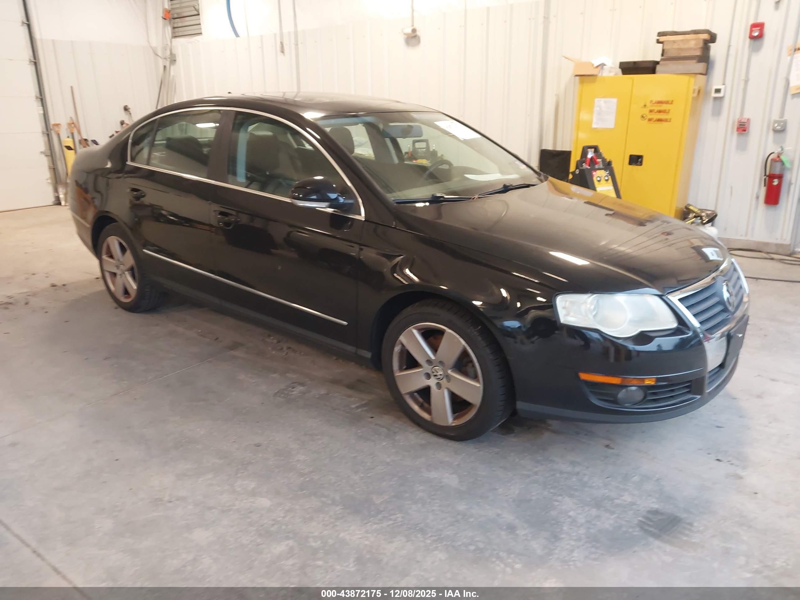 2009 Volkswagen Passat Komfort Black vin: WVWJK73C19P040900