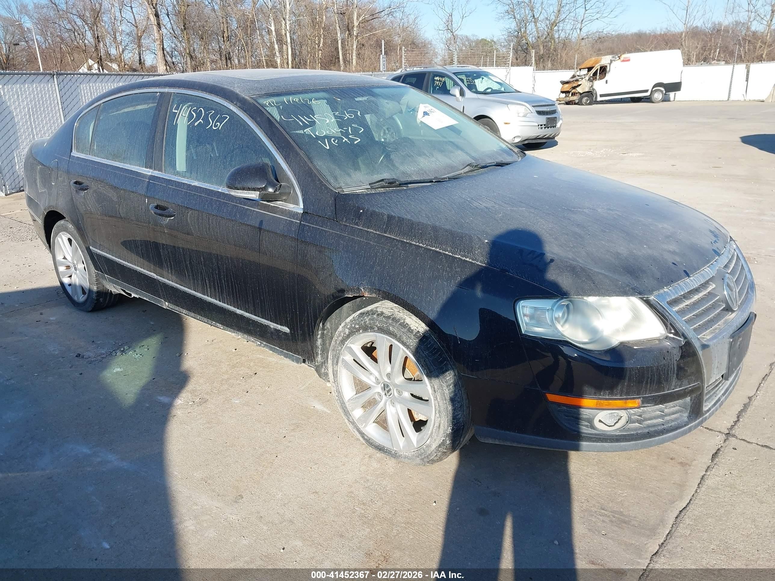 2009 Volkswagen Passat Komfort Black vin: WVWJK73C39P034306