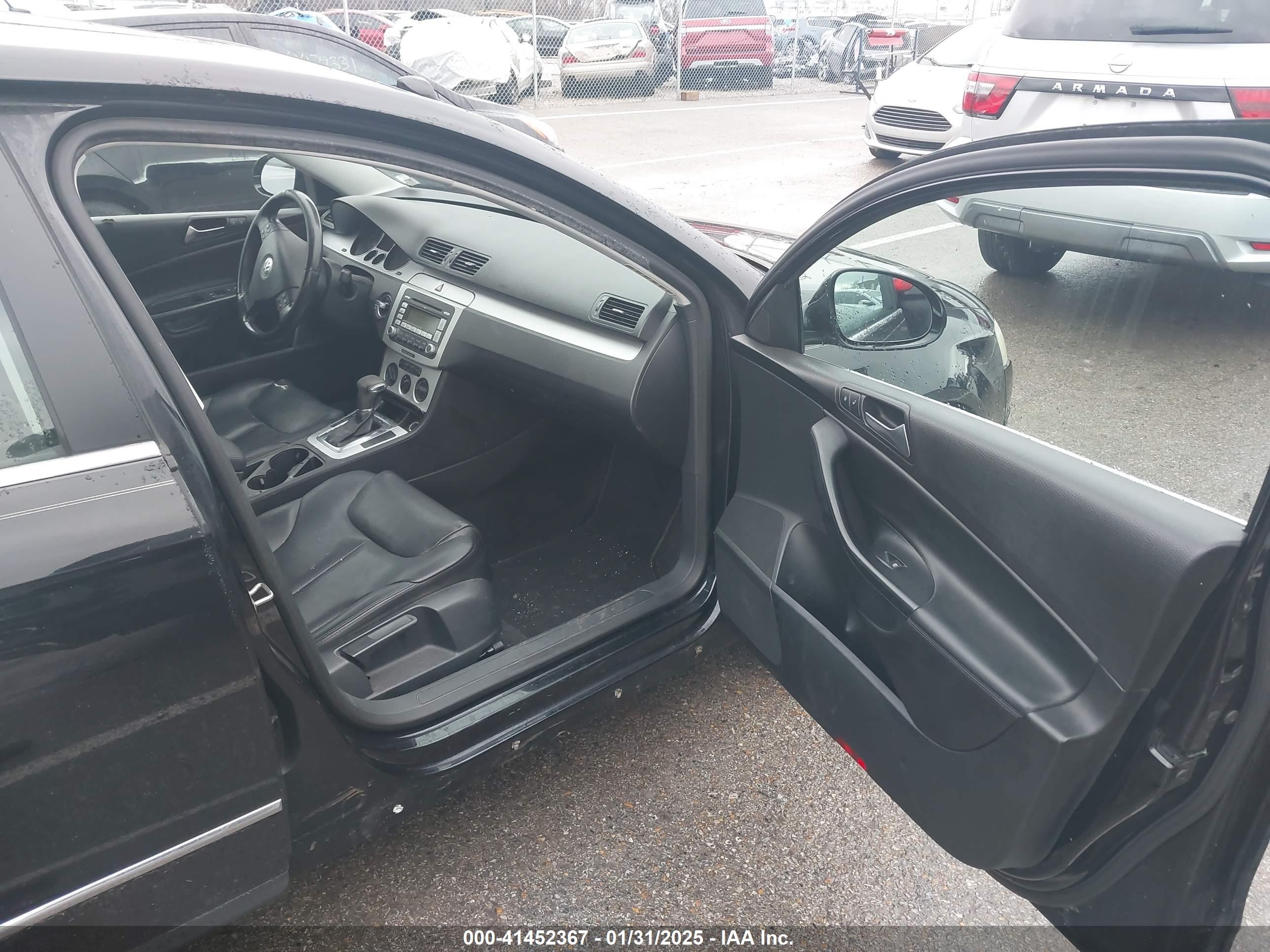 2009 Volkswagen Passat Komfort Black vin: WVWJK73C39P034306