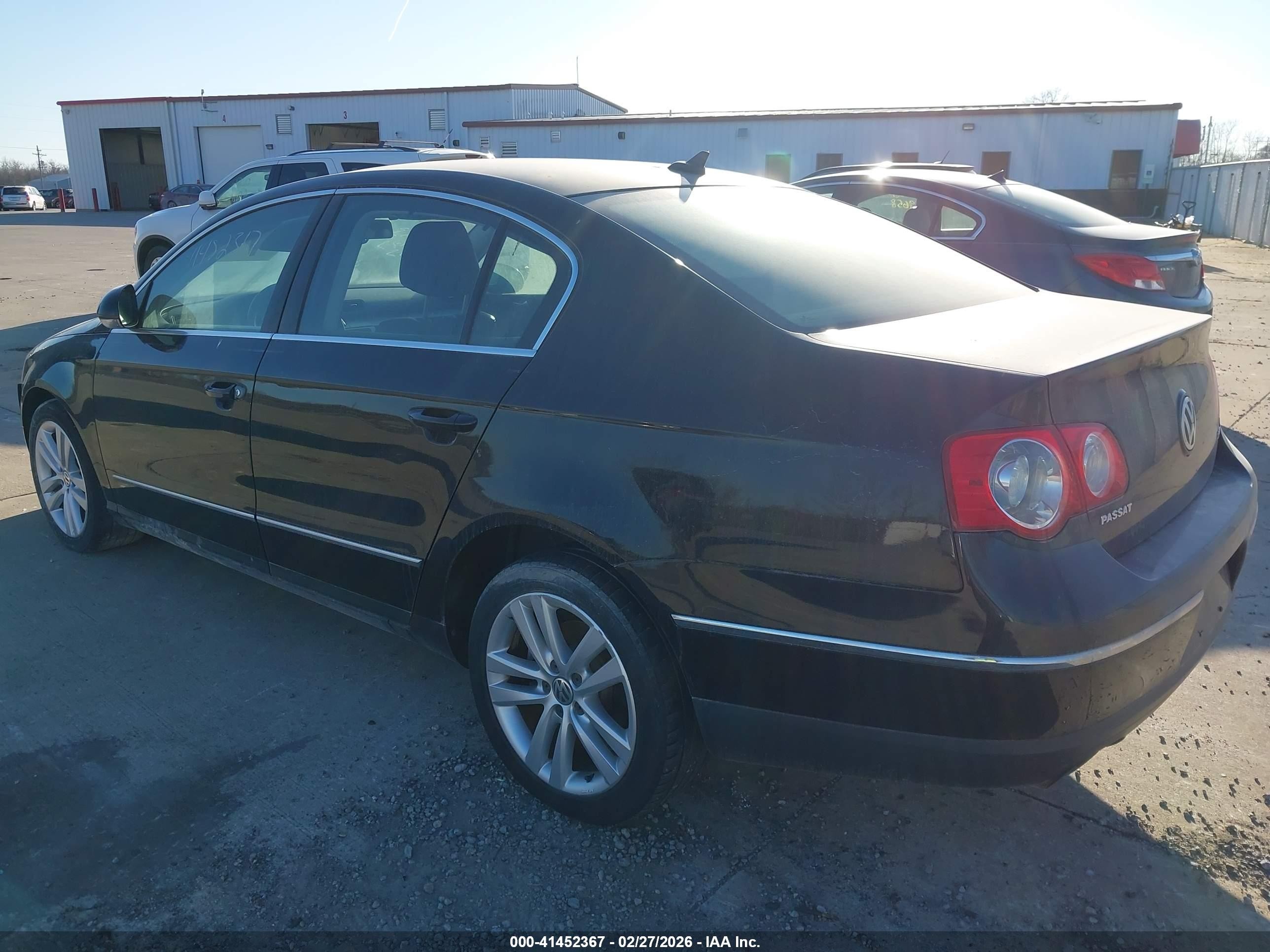 2009 Volkswagen Passat Komfort Black vin: WVWJK73C39P034306