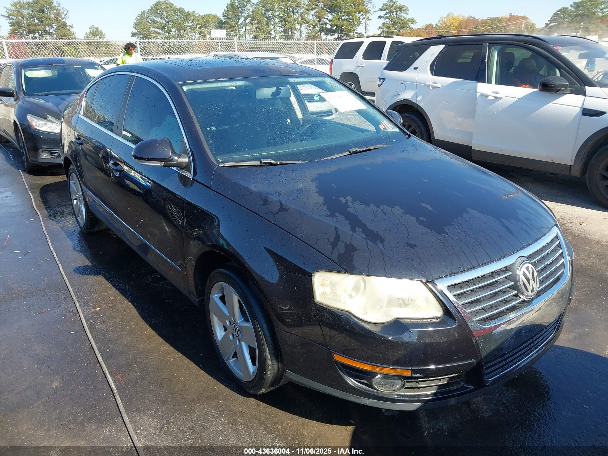 2009 Volkswagen Passat Komfort Black vin: WVWJK73CX9P042466