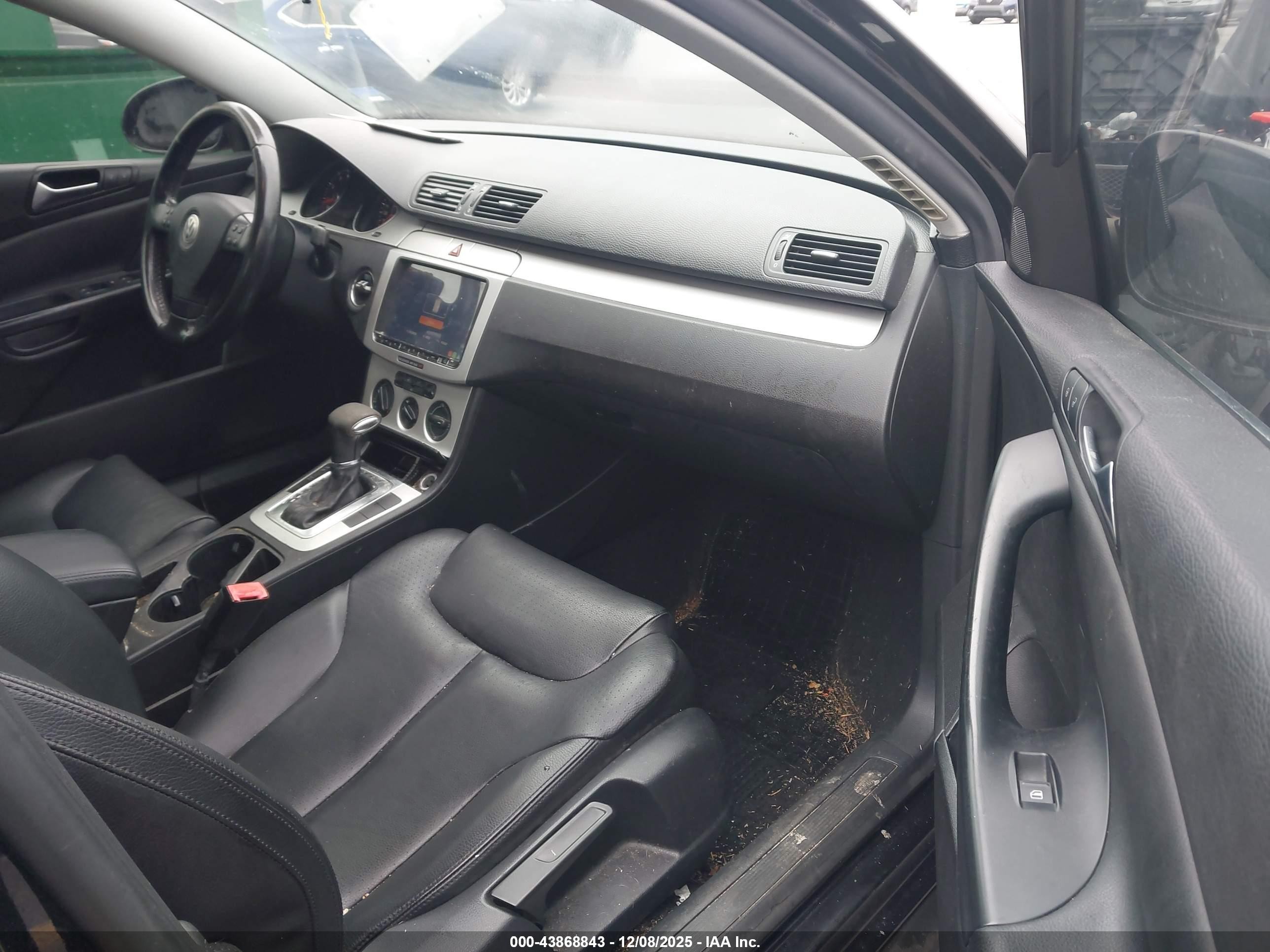 2009 Volkswagen Passat Komfort Black vin: WVWJK73CX9P059882