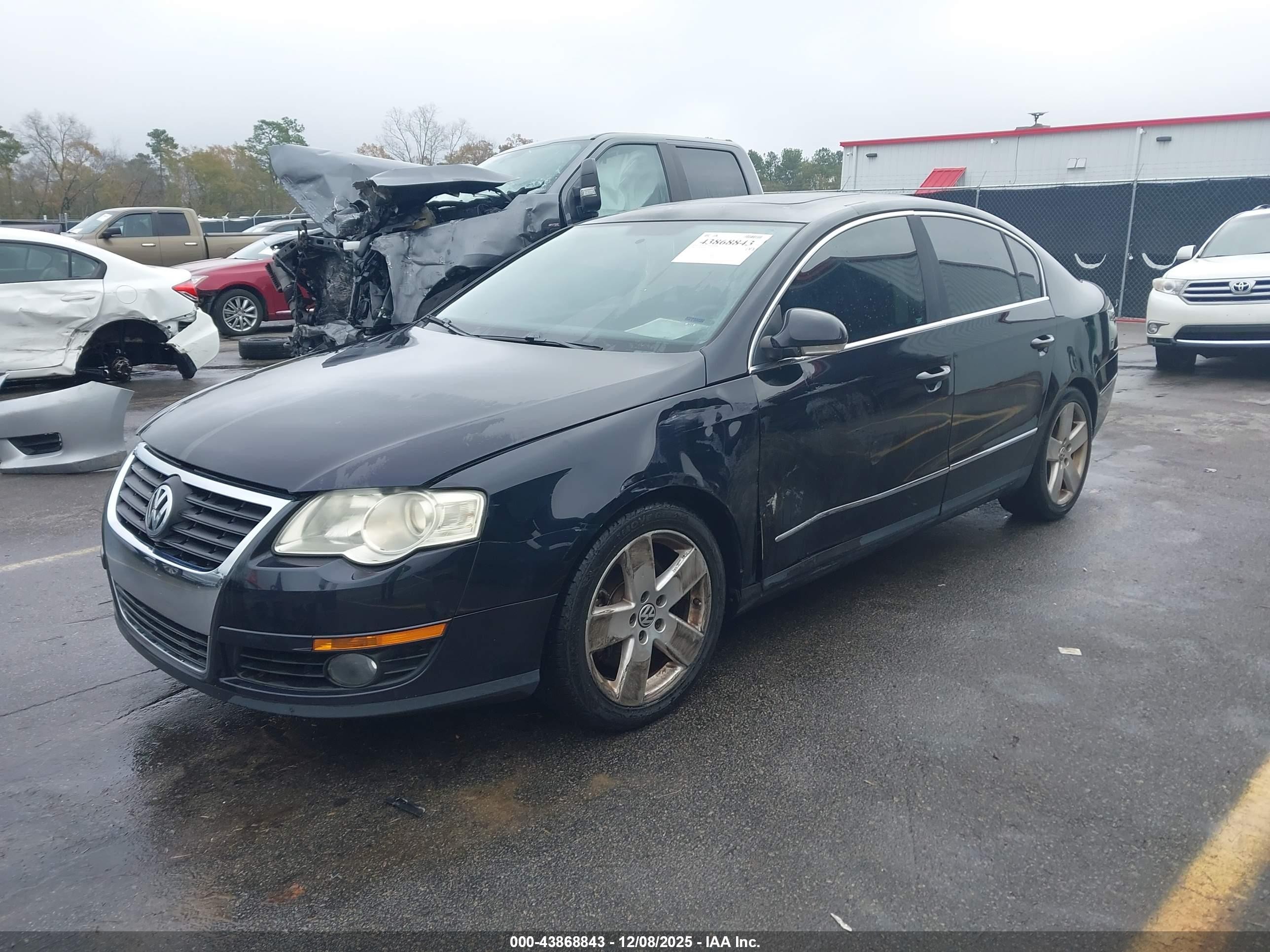 2009 Volkswagen Passat Komfort Black vin: WVWJK73CX9P059882