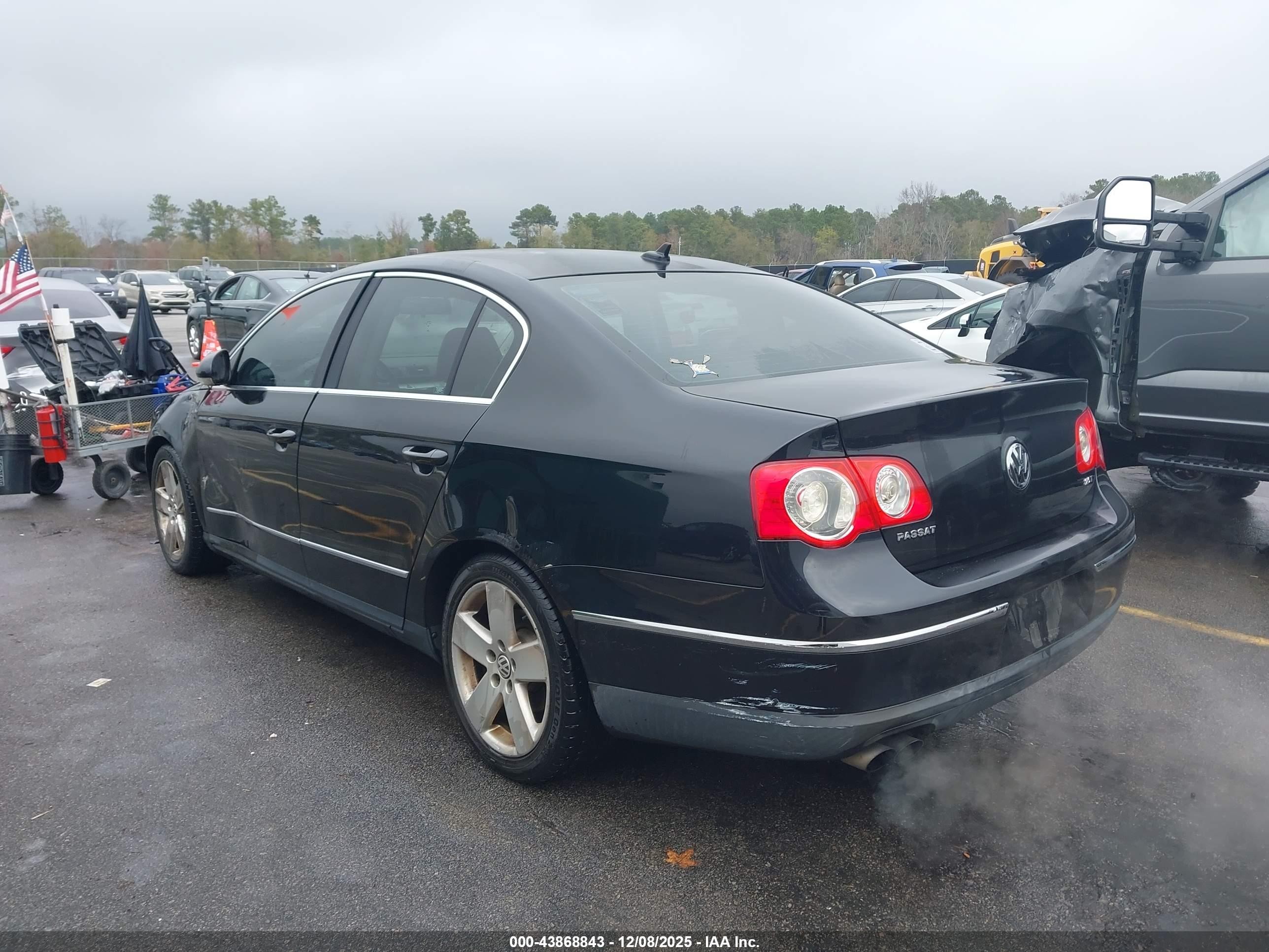 2009 Volkswagen Passat Komfort Black vin: WVWJK73CX9P059882