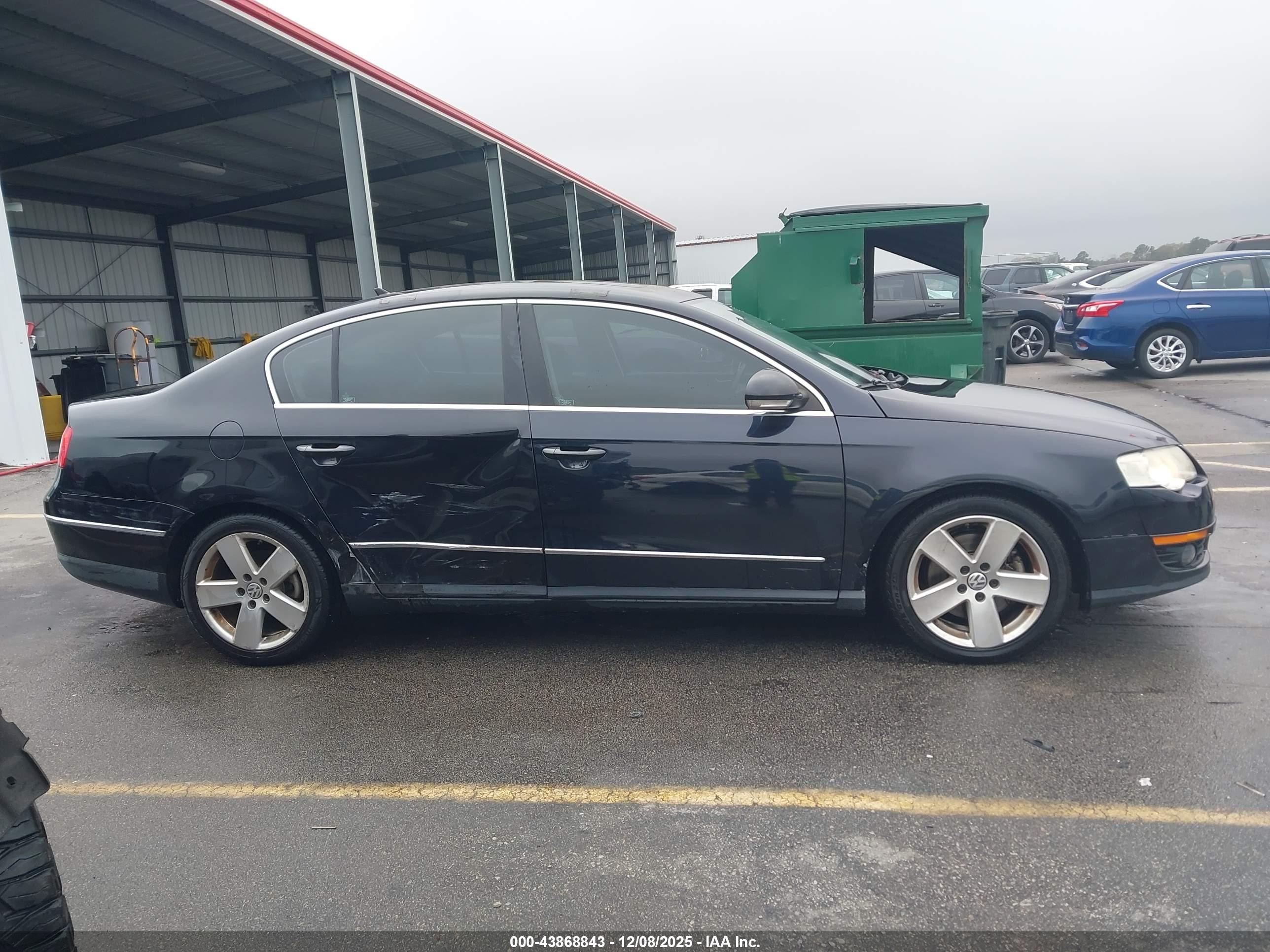 2009 Volkswagen Passat Komfort Black vin: WVWJK73CX9P059882