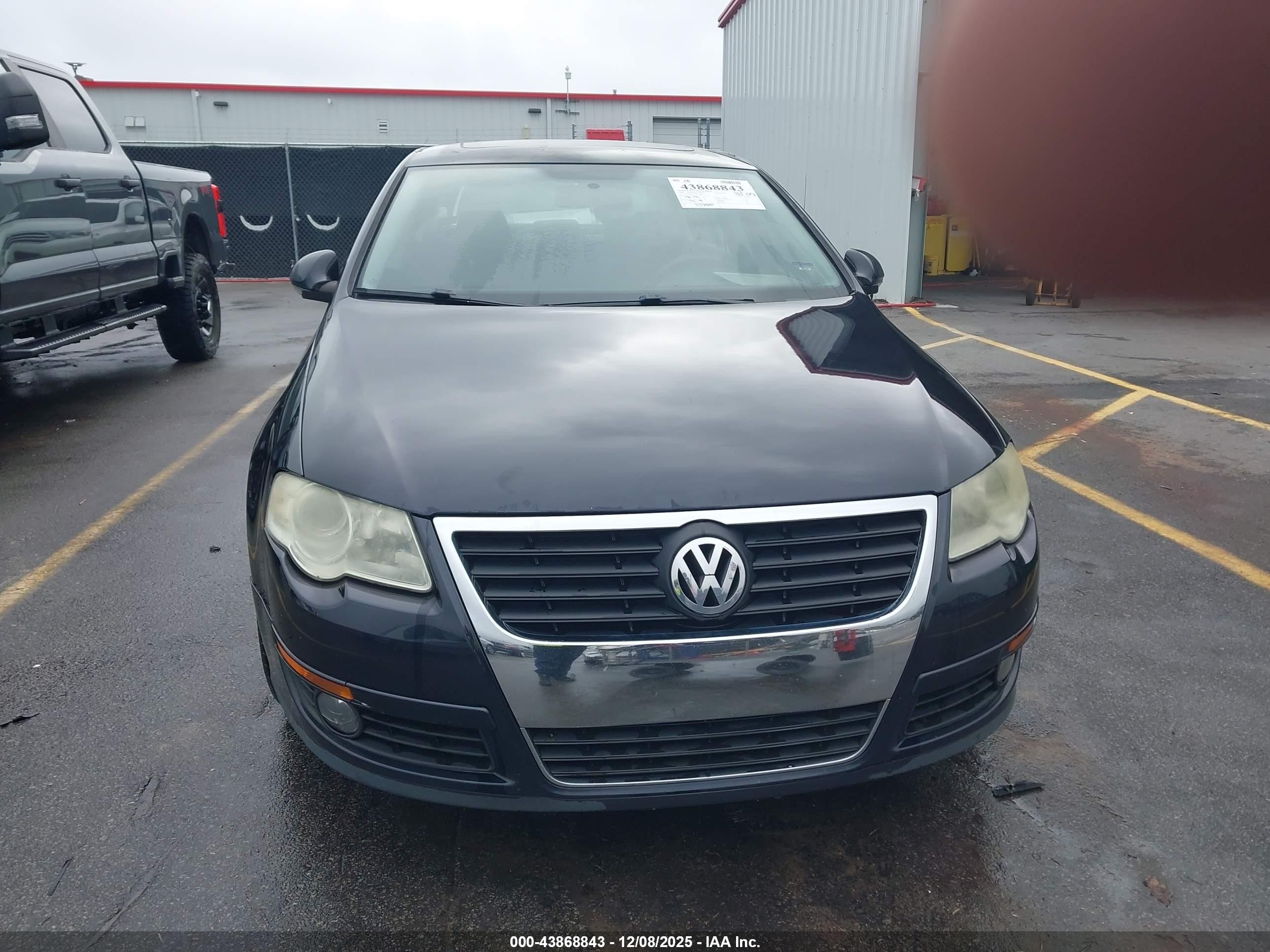 2009 Volkswagen Passat Komfort Black vin: WVWJK73CX9P059882