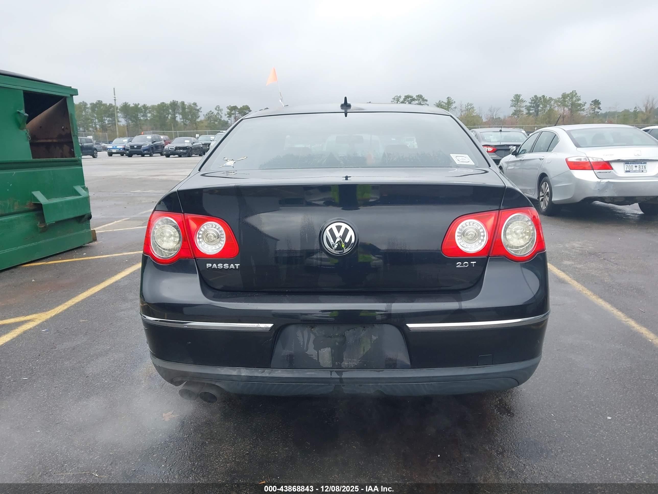 2009 Volkswagen Passat Komfort Black vin: WVWJK73CX9P059882