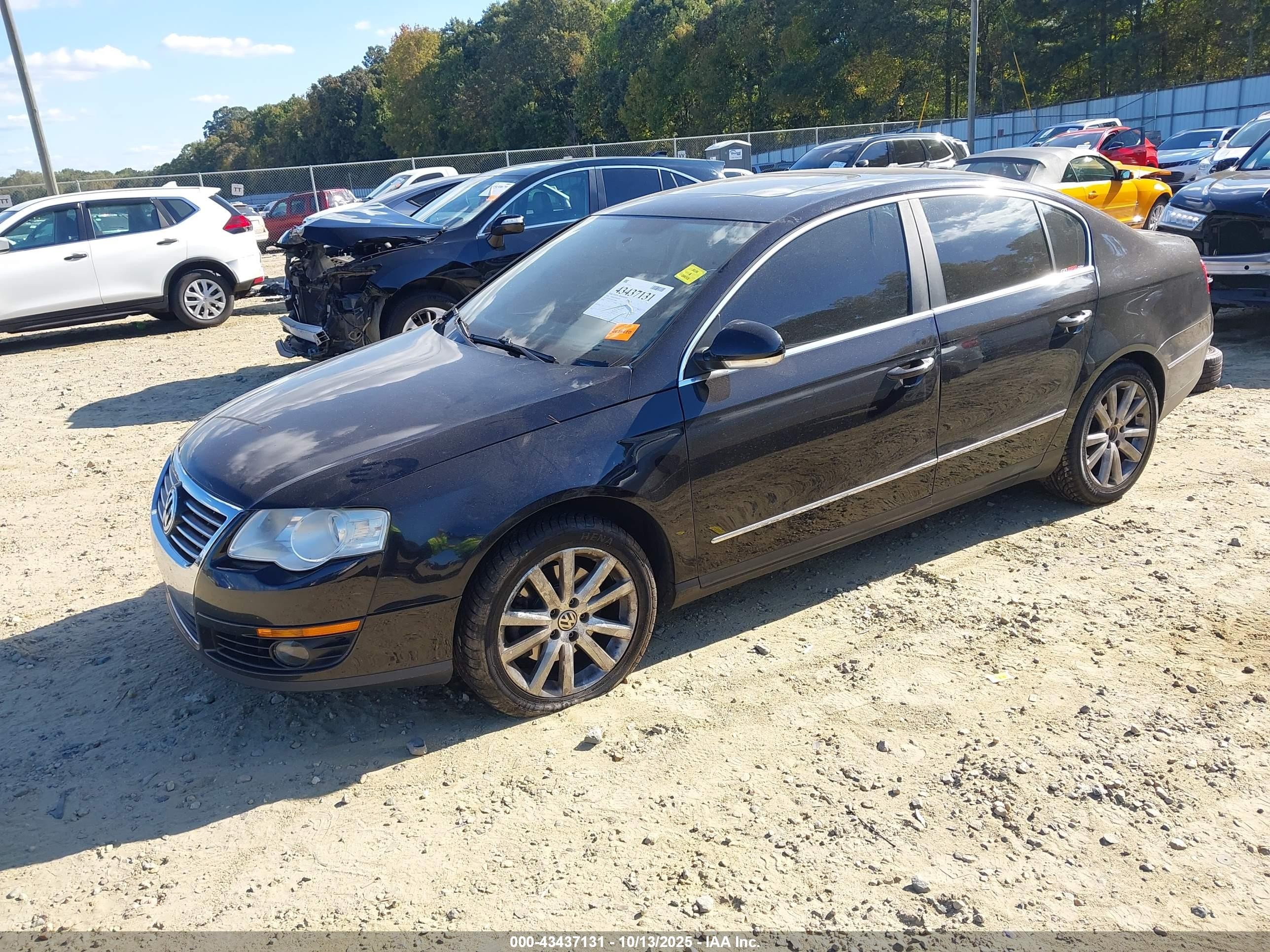 2010 Volkswagen Passat Komfort Black vin: WVWJK7AN6AE100688