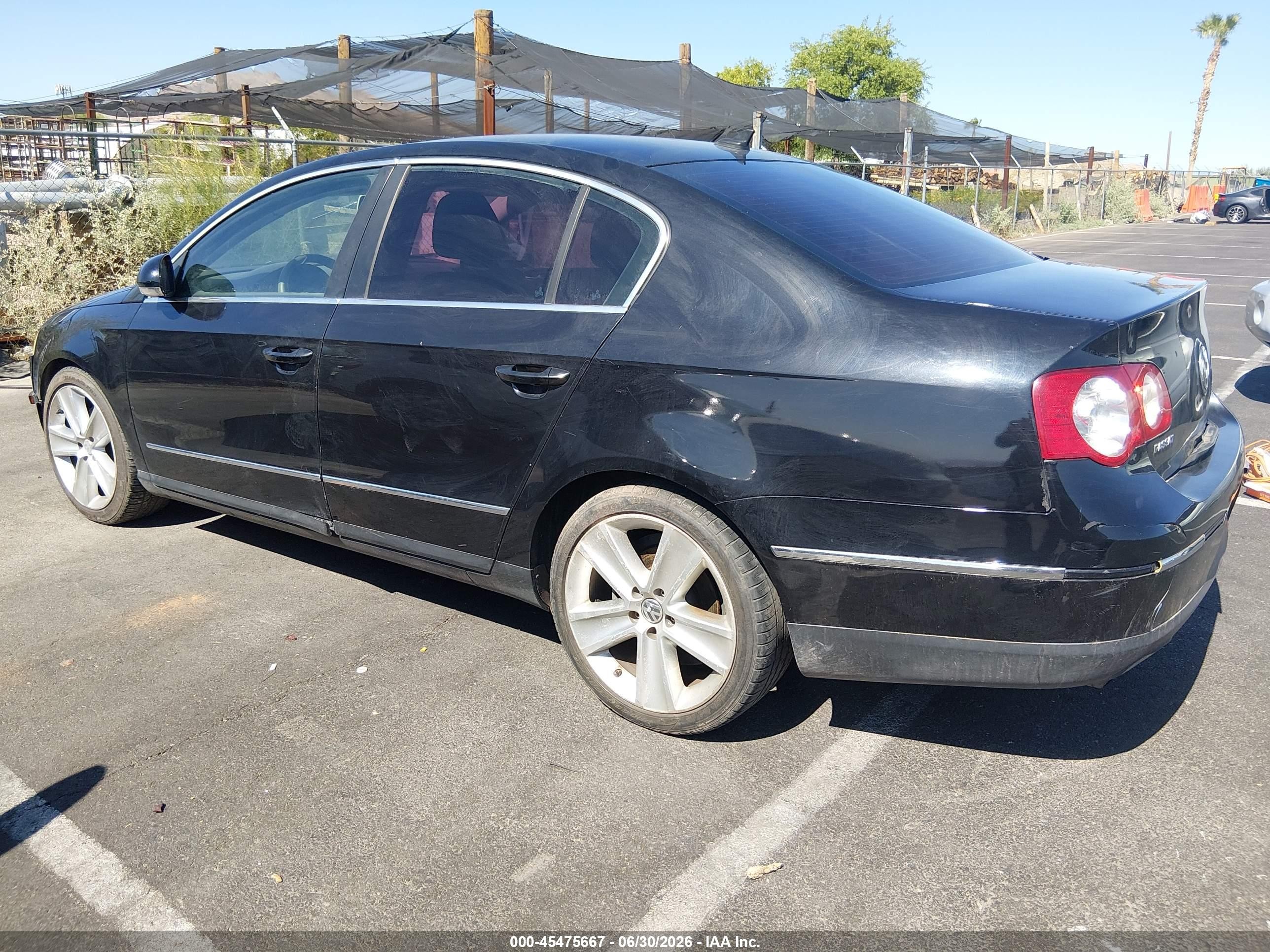 2010 Volkswagen Passat Komfort Black vin: WVWJM7AN3AE081611