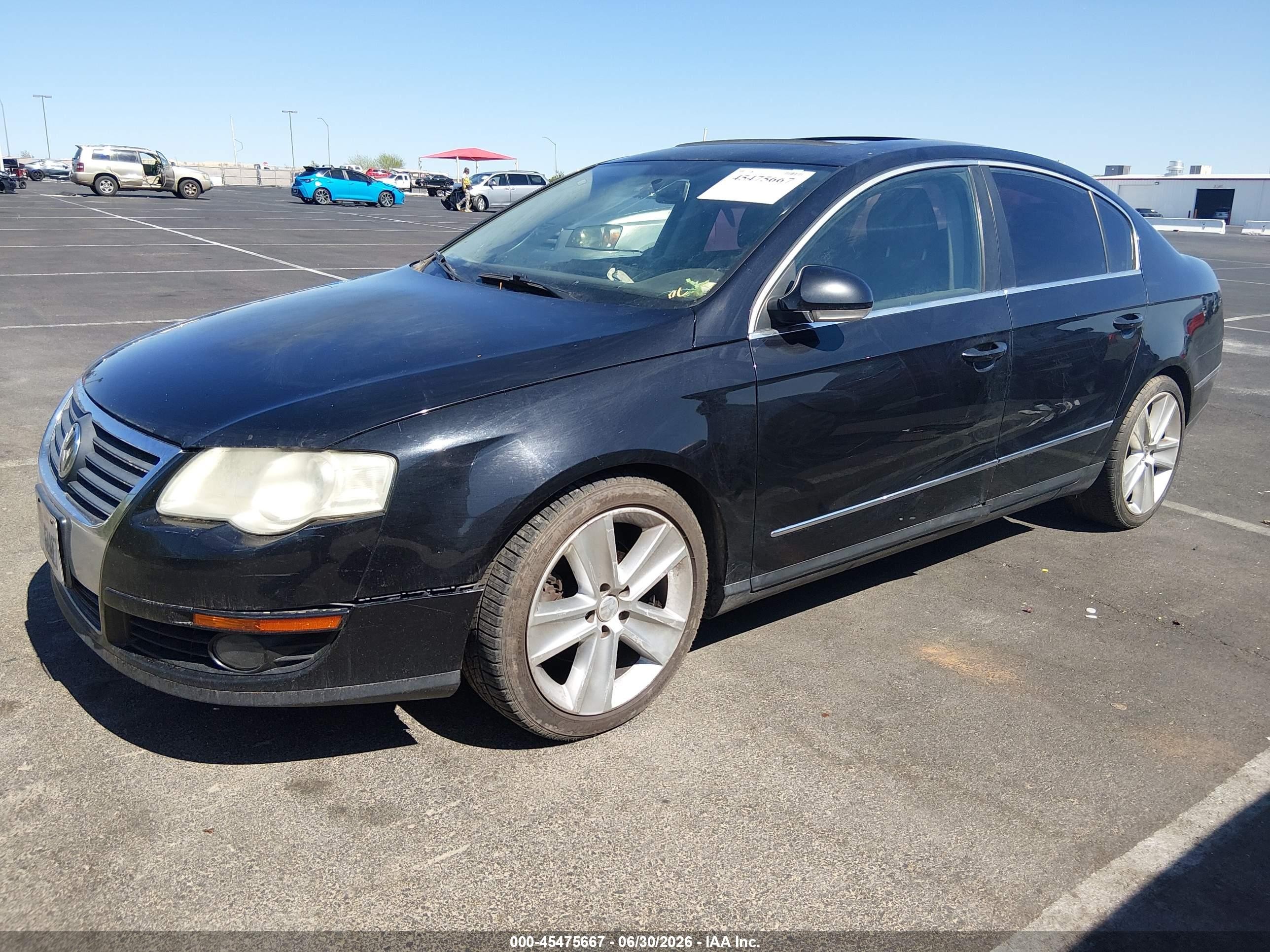 2010 Volkswagen Passat Komfort Black vin: WVWJM7AN3AE081611