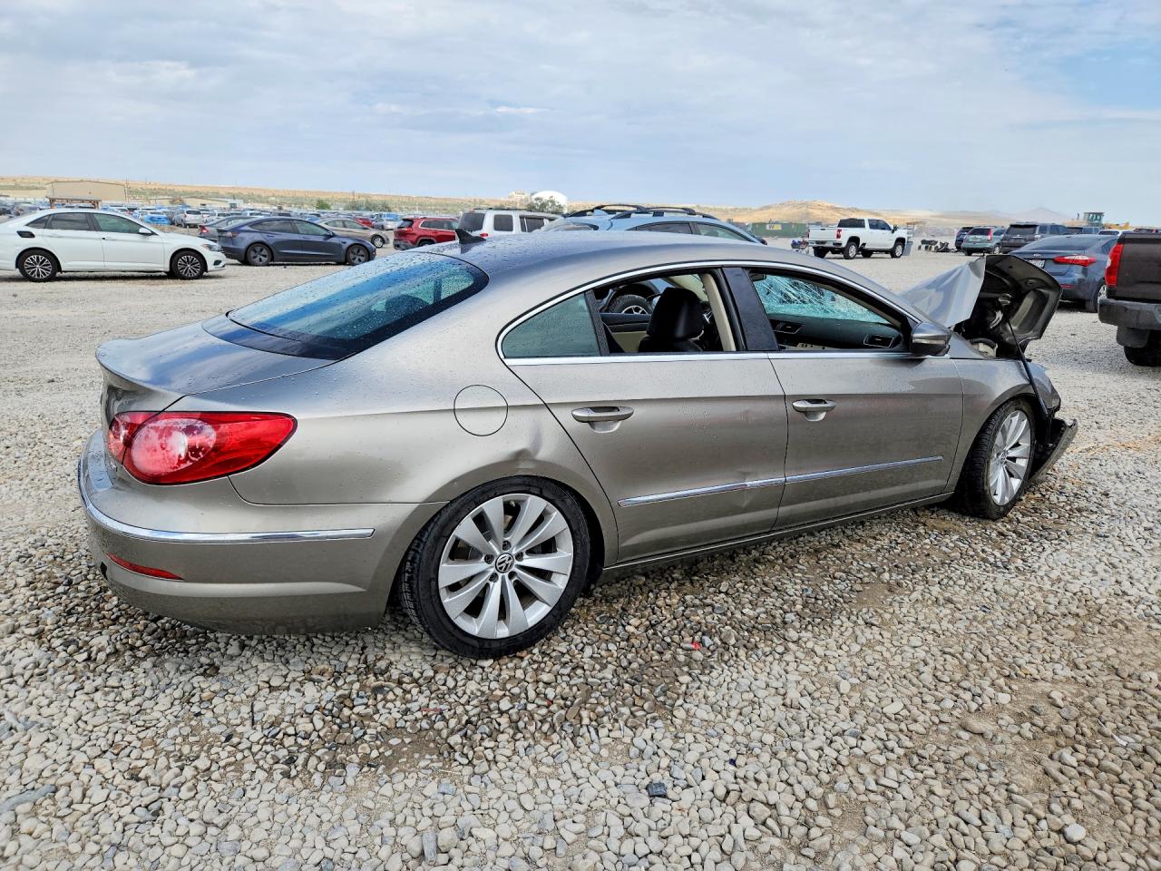 2012 Volkswagen Cc Sport Желто-коричневый vin: WVWMN7AN6CE500225