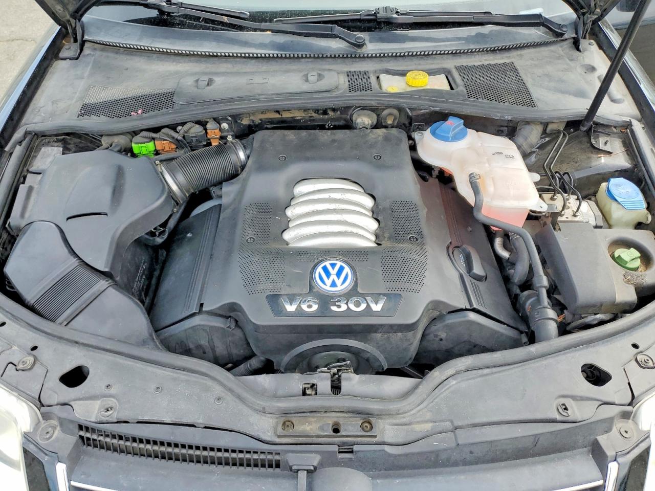 2003 Volkswagen Passat Glx Черный vin: WVWRH63B93P035843