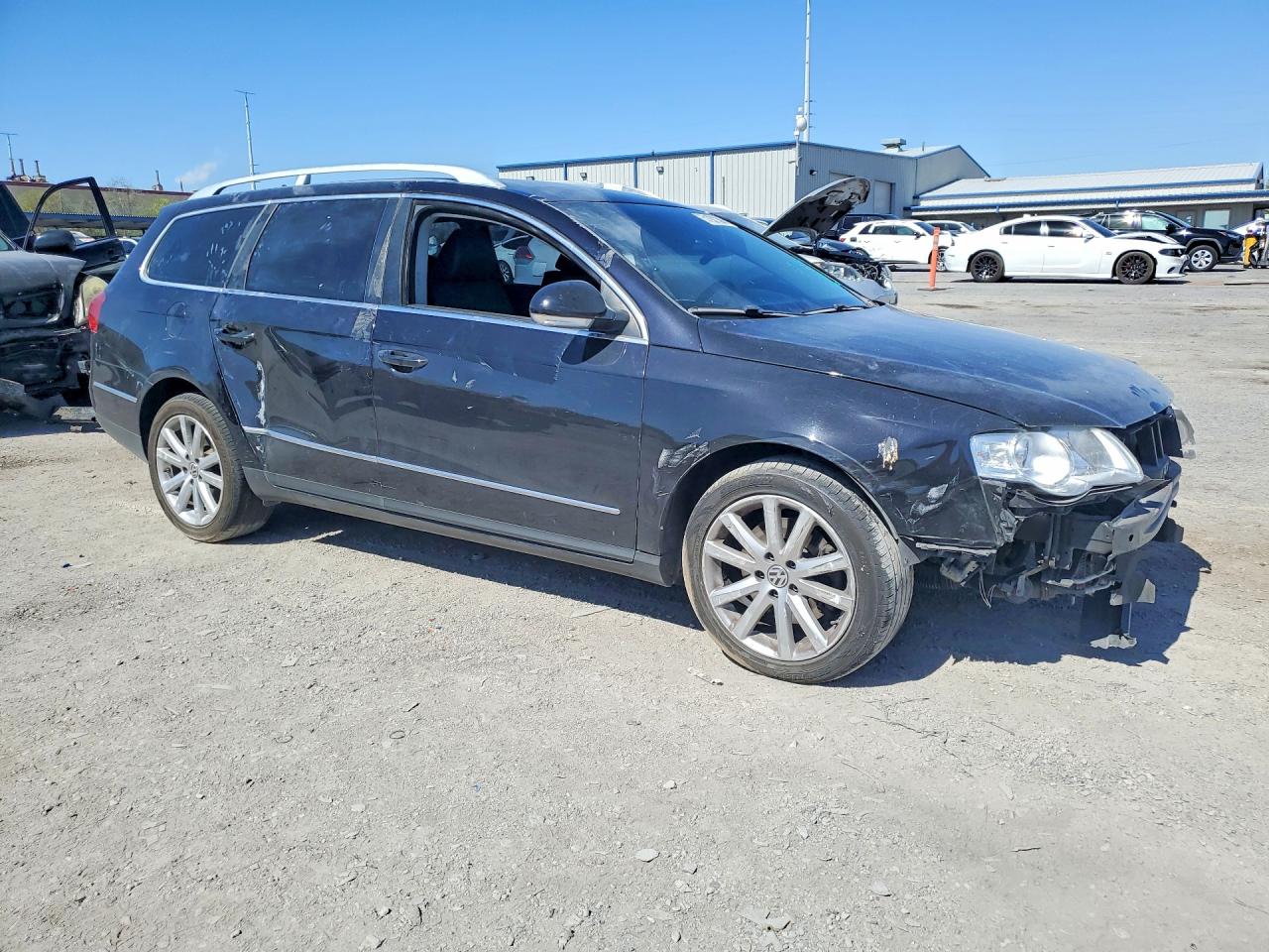 2010 Volkswagen Passat Komfort Black vin: WVWXK7AN0AE003285