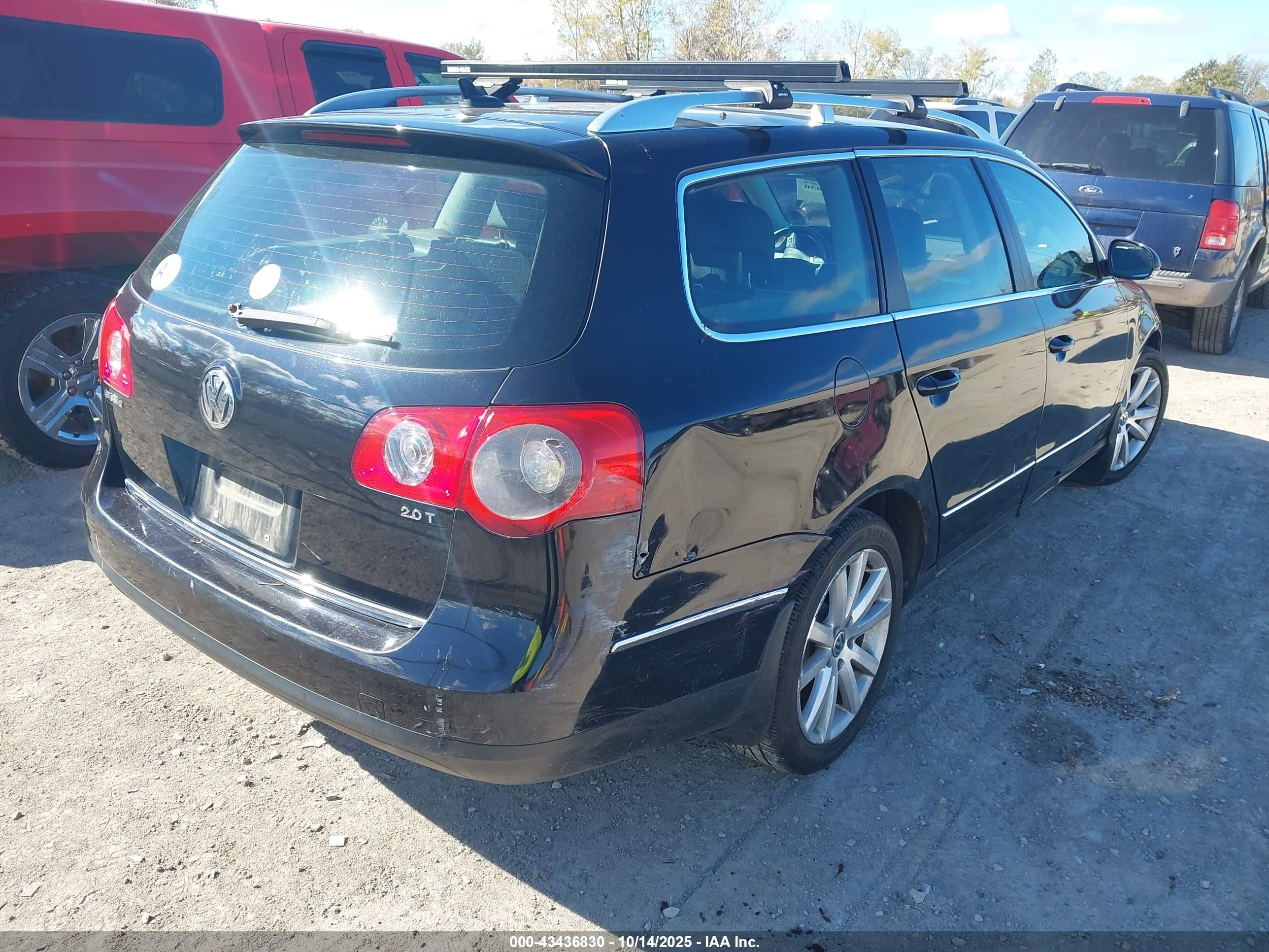 2010 Volkswagen Passat Komfort Black vin: WVWXM7AN4AE120071