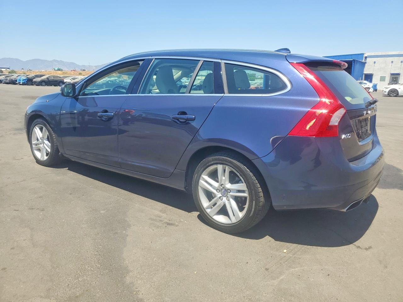 2015 Volvo V60 Platinum Blue vin: YV126MED8F1192212