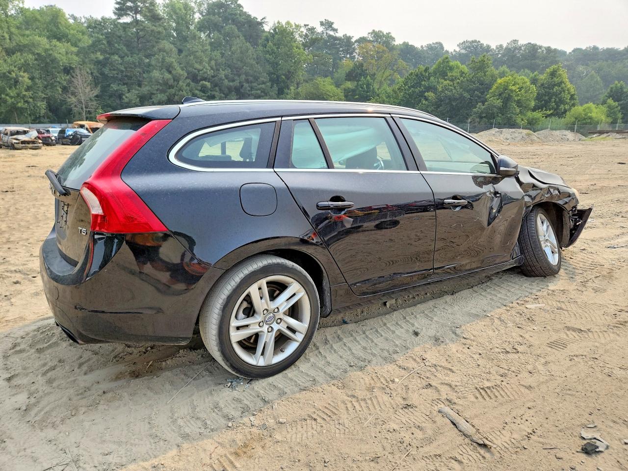 2015 Volvo V60 Premier Black vin: YV140MEB5F1207676