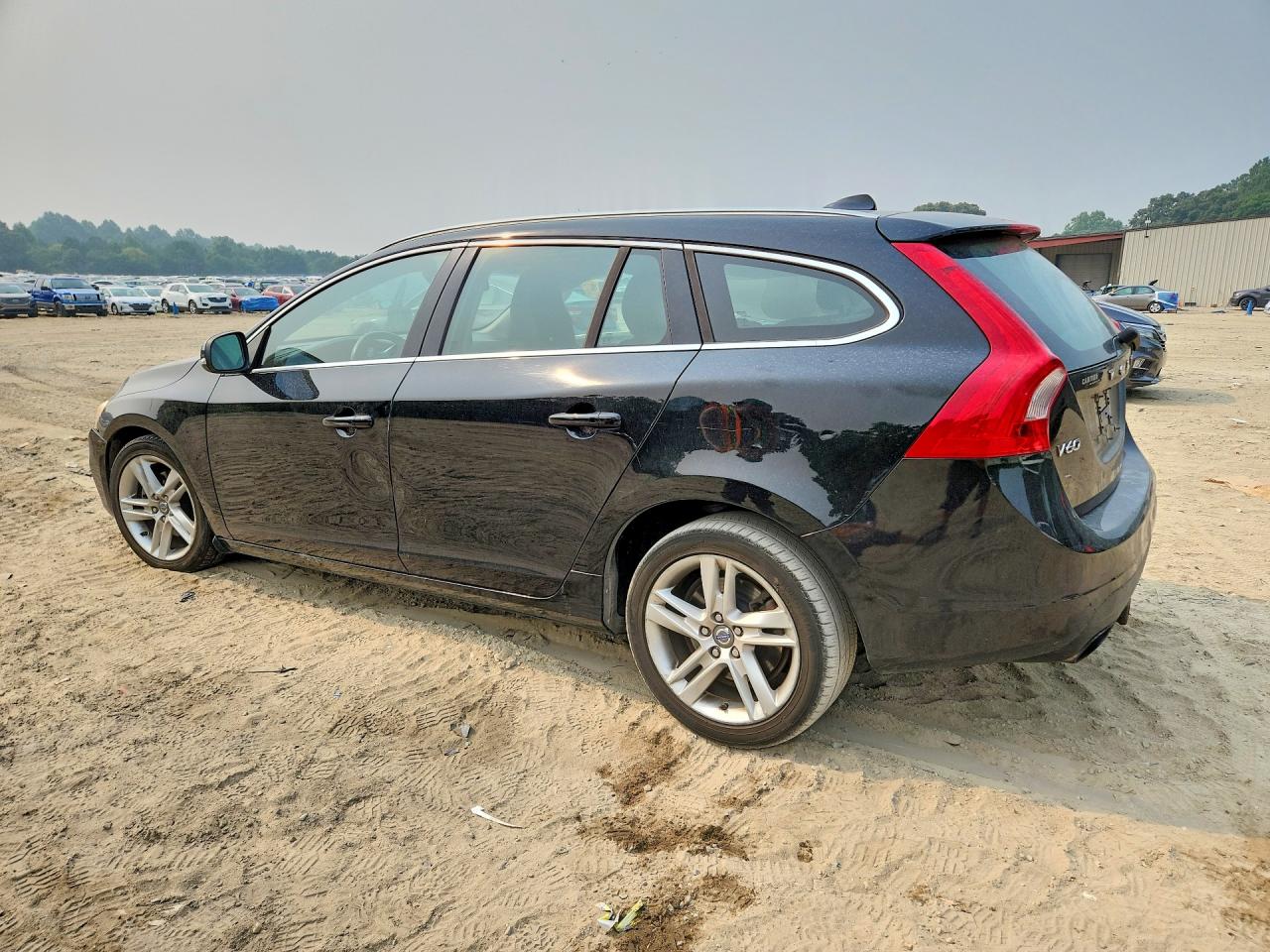 2015 Volvo V60 Premier Black vin: YV140MEB5F1207676