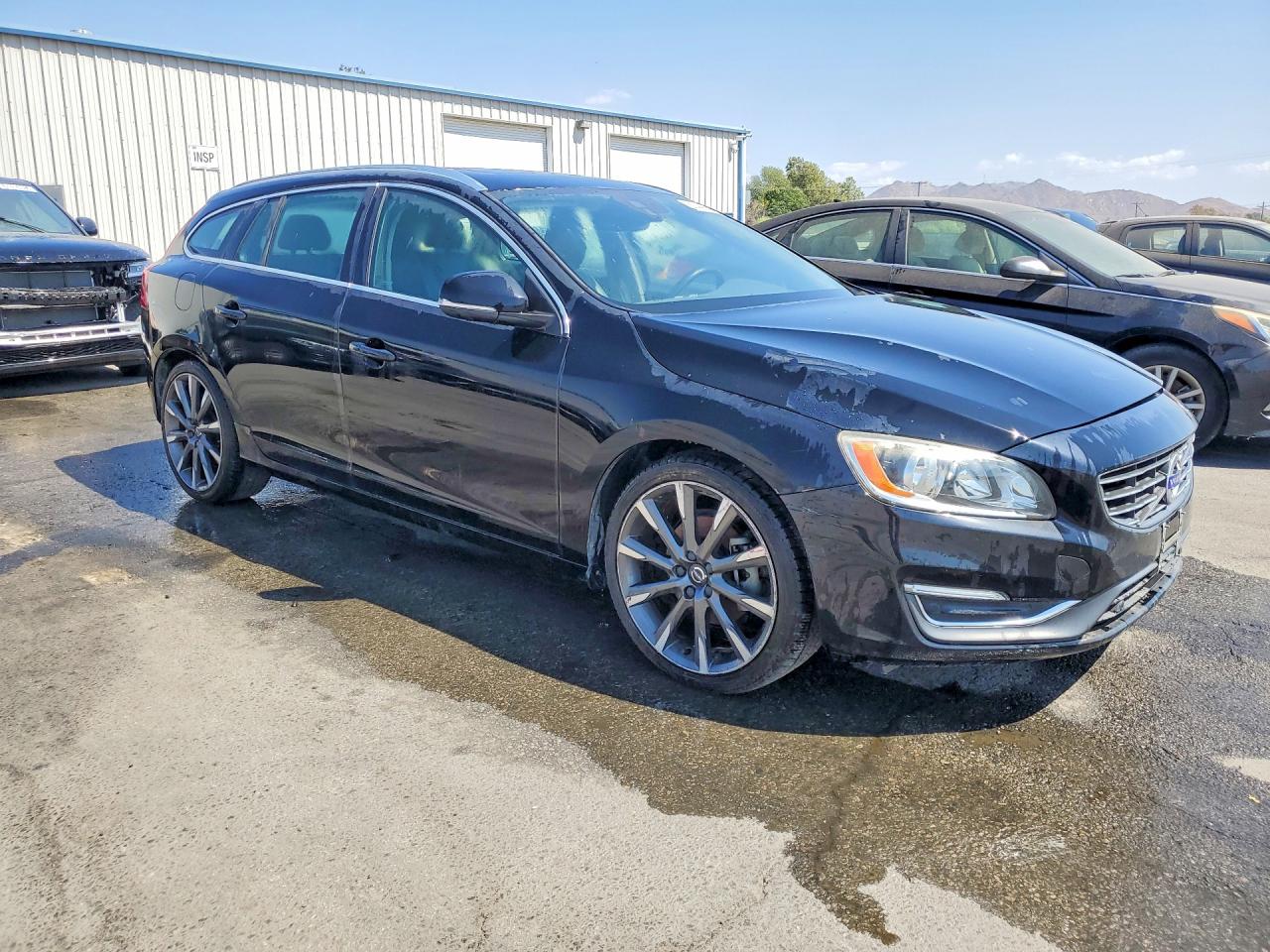2015 Volvo V60 Premier Black vin: YV140MEK3F1259758