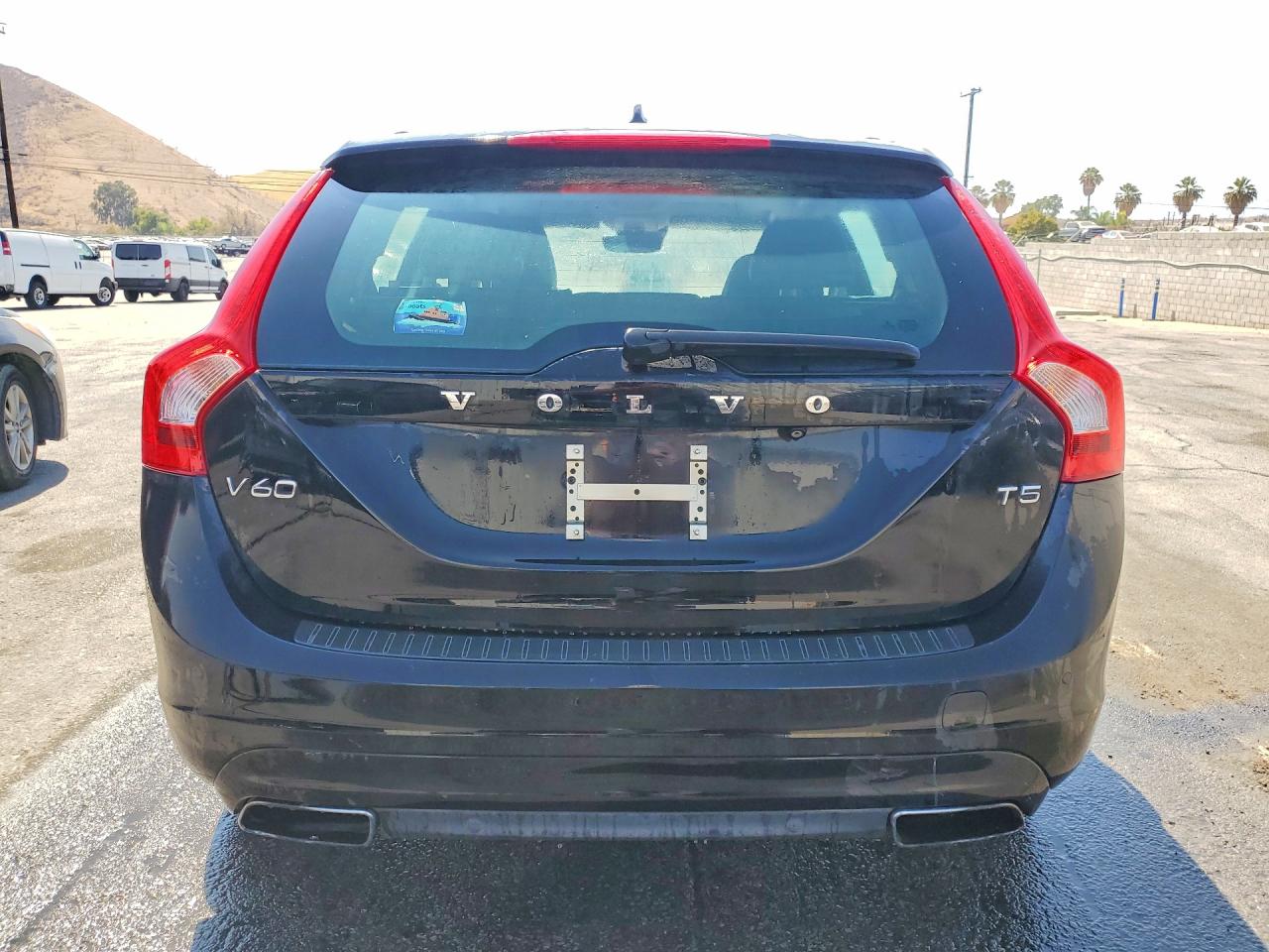 2015 Volvo V60 Premier Black vin: YV140MEK3F1259758