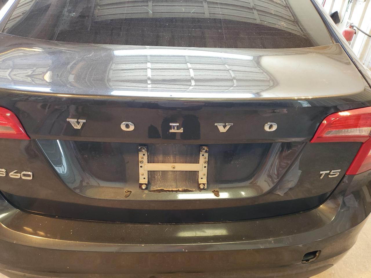 2013 Volvo S60 T5 Black vin: YV1612FS6D1212732 Damage: Deck Lid, Rust, 1 To 2 Inches