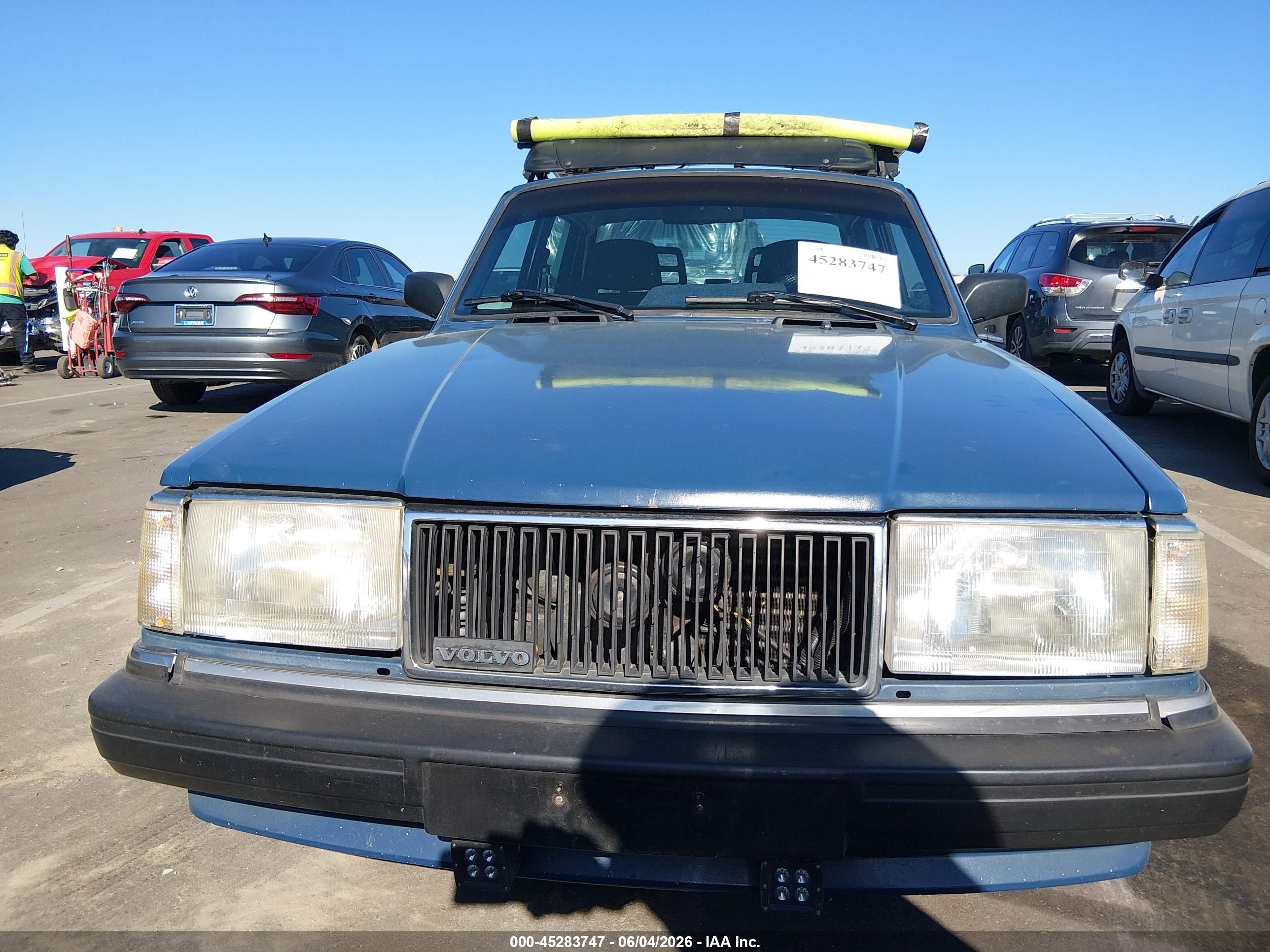 1991 Volvo 240   Blue vin: YV1AA8845M1447599