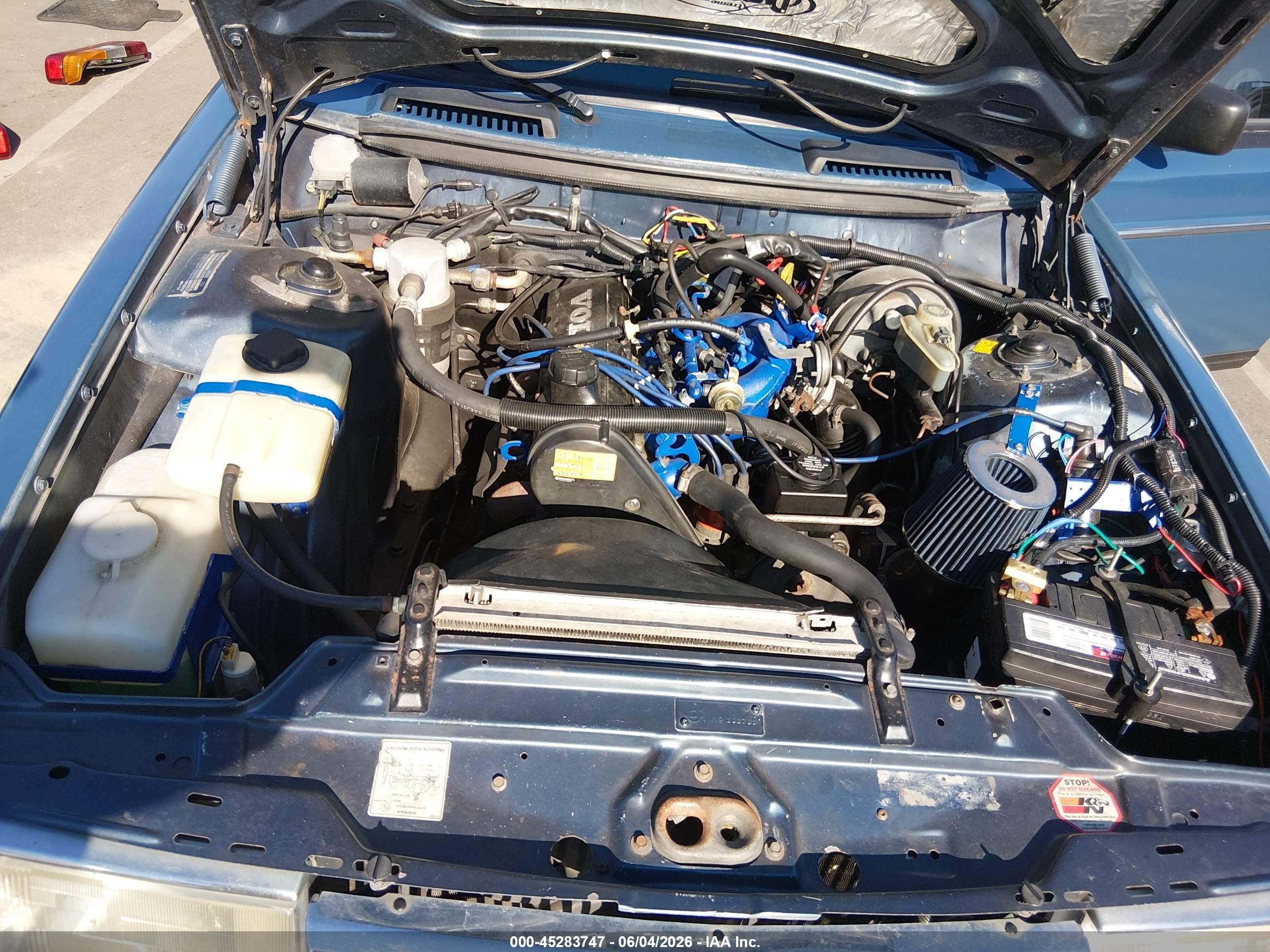 1991 Volvo 240   Blue vin: YV1AA8845M1447599