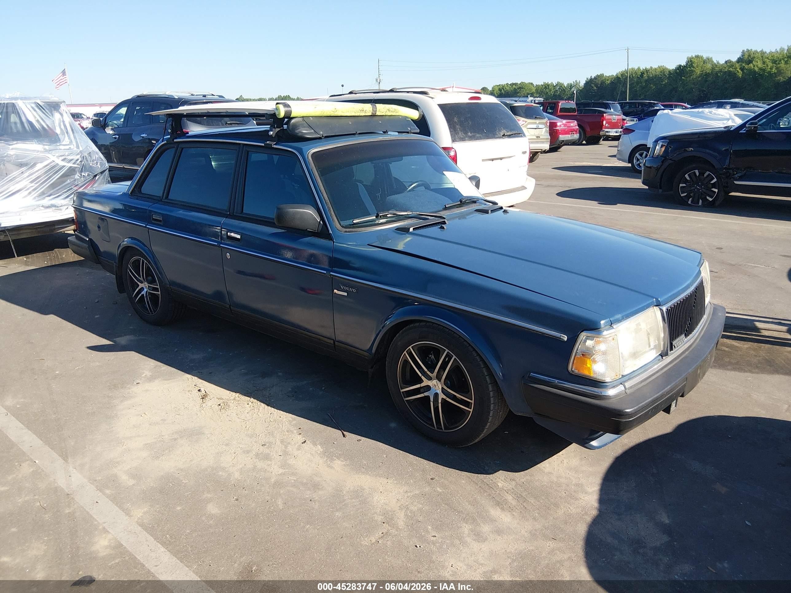 1991 Volvo 240   Blue vin: YV1AA8845M1447599