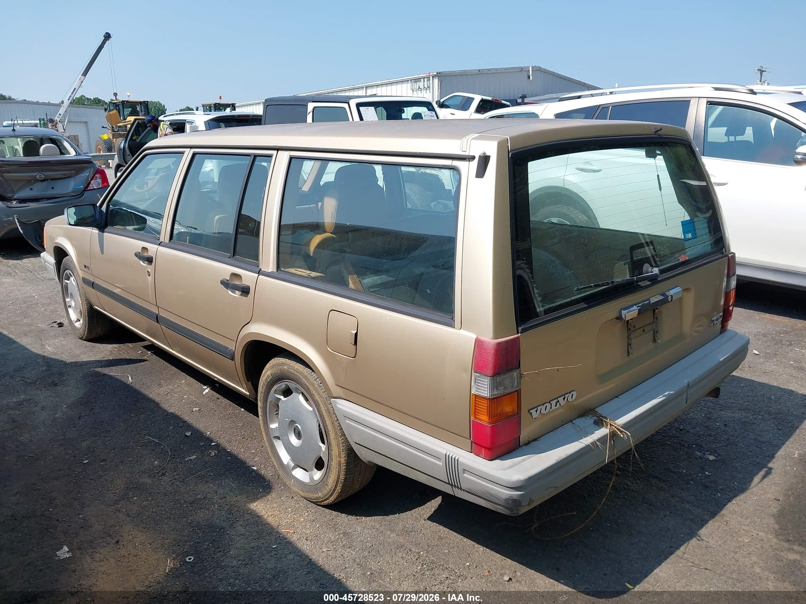 1991 Volvo 740   Gold vin: YV1FA8858M2333539