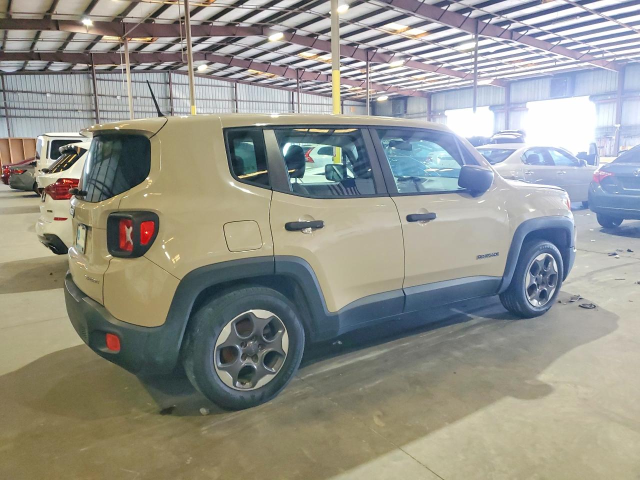 2015 Jeep Renegade Sport Tan vin: ZACCJAAT0FPB73186