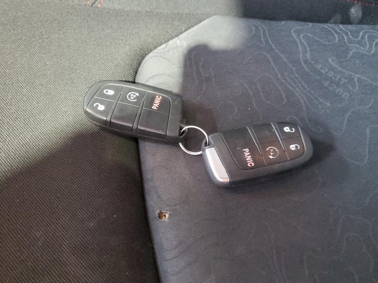 2015 Jeep Renegade Trailhawk Orange vin: ZACCJBCT0FPB64868 Damage: Left Front Seat Cushion, Burn Hole, 1/8 To 1/2 Inch
