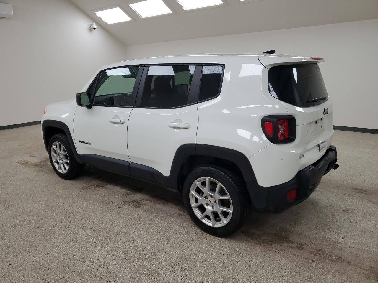 2023 Jeep Renegade Latitude White vin: ZACNJDB16PPP68101 Damage: Rear Bumper Left Molding, Heavy Scratch, 1/8 To 1/2 Inch