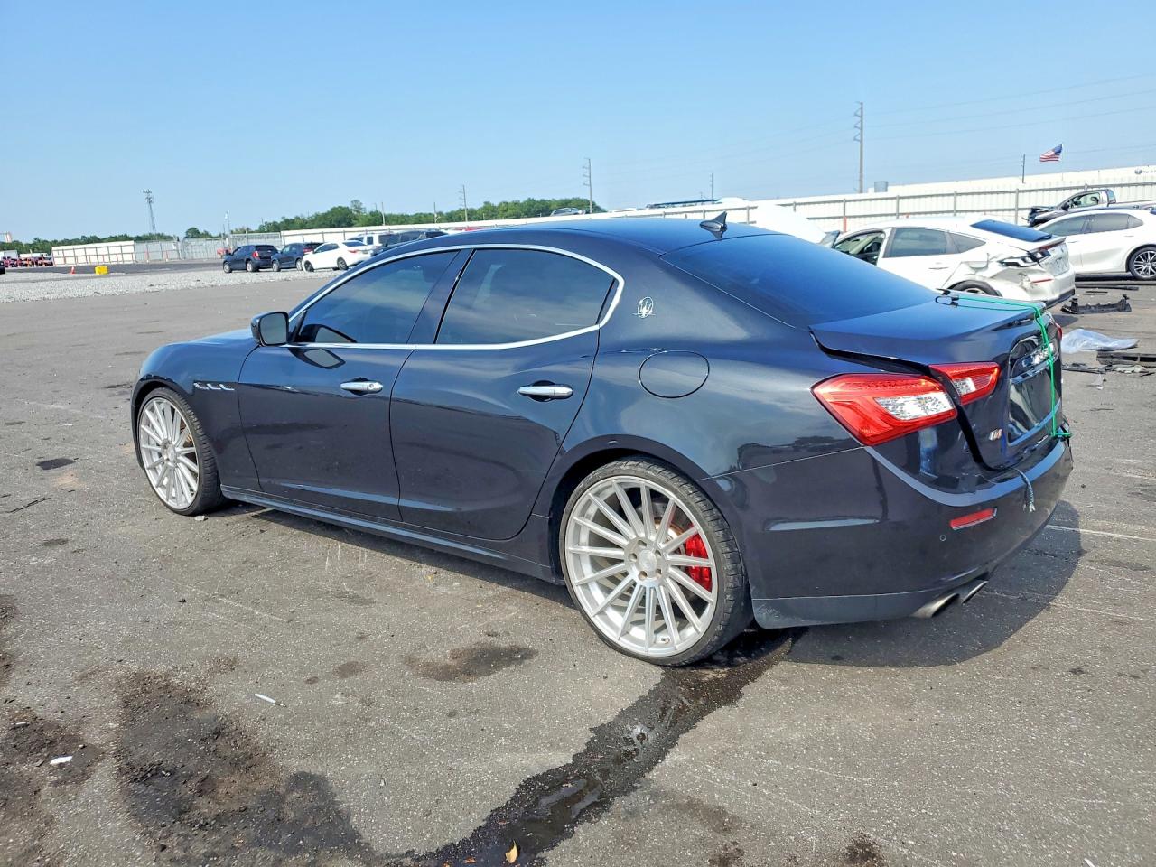2014 Maserati Ghibli S Black vin: ZAM57RTA0E1093576