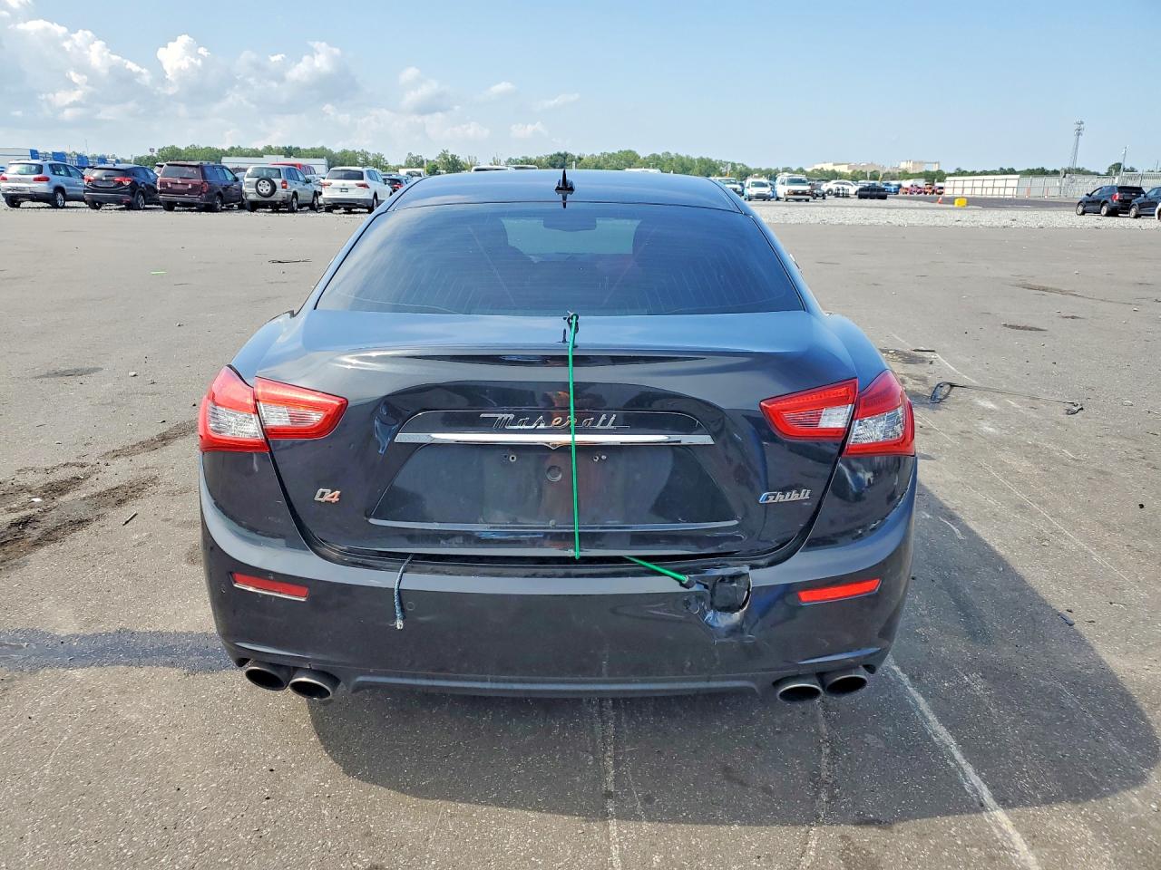 2014 Maserati Ghibli S Black vin: ZAM57RTA0E1093576