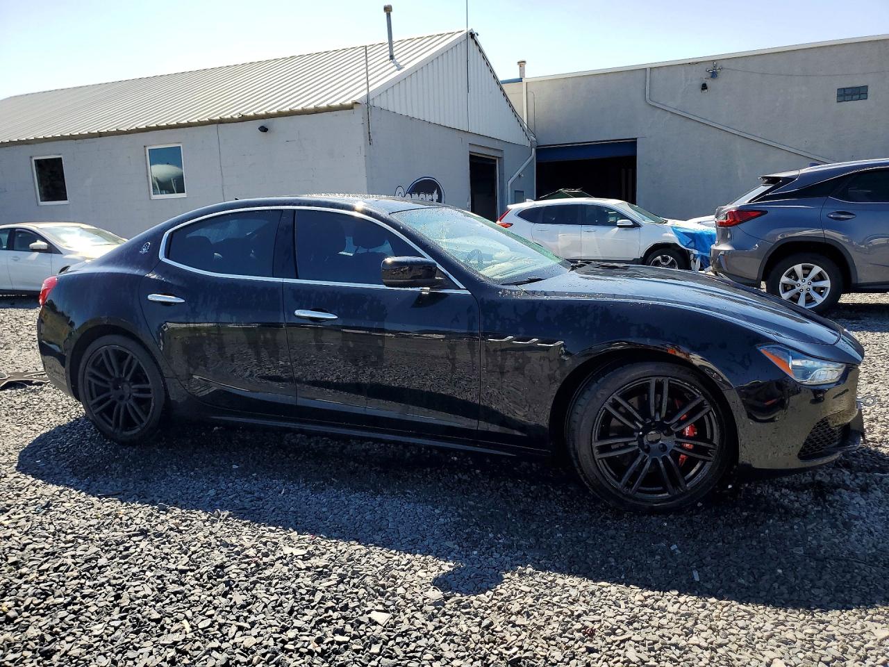 2016 Maserati Ghibli S Black vin: ZAM57RTA0G1190702