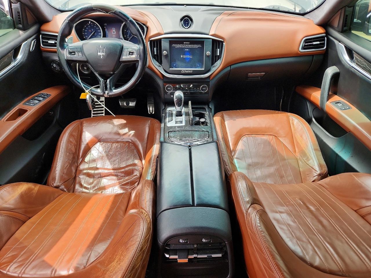 2014 Maserati Ghibli S Black vin: ZAM57RTA7E1090027